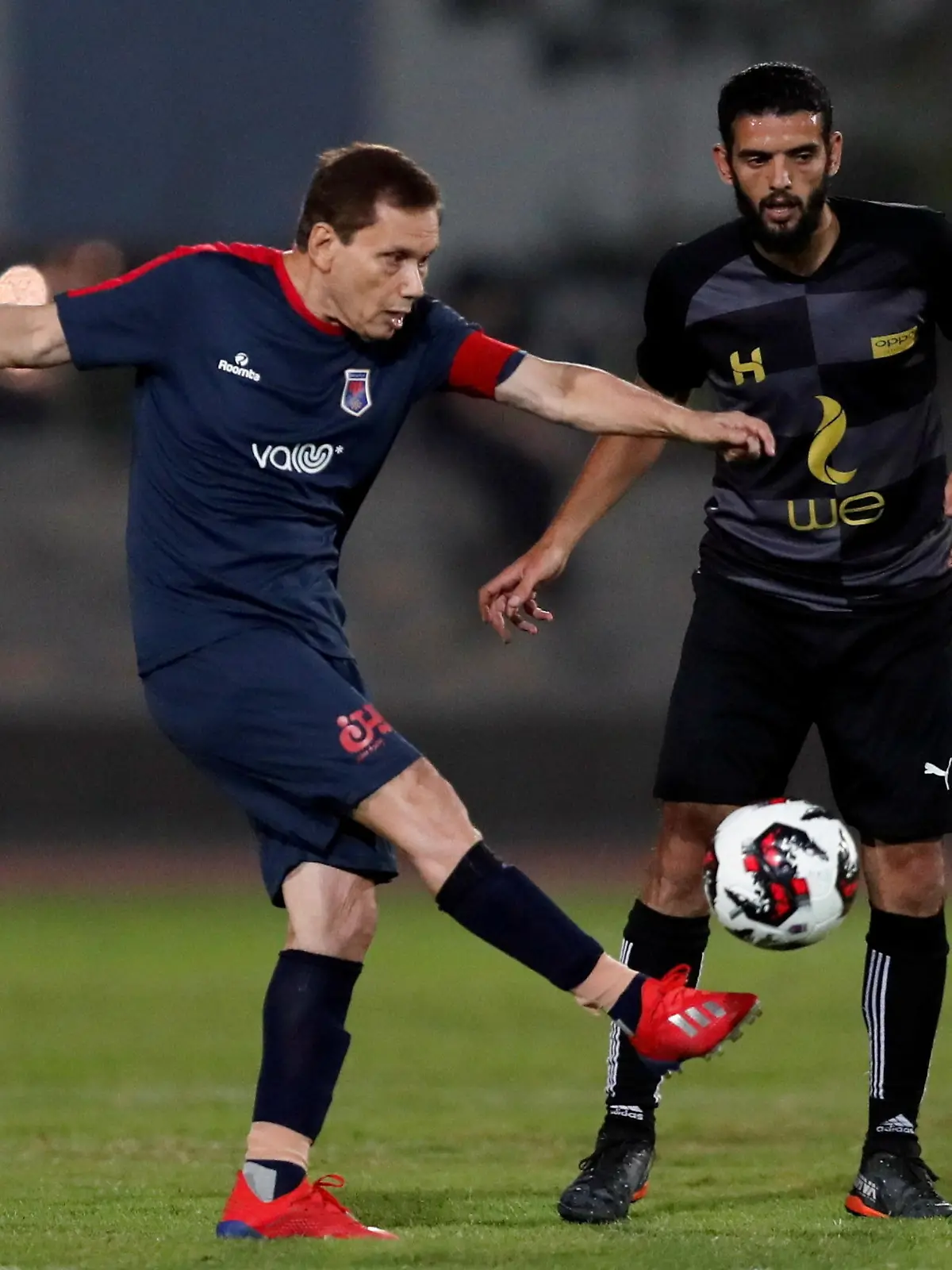 Ezzeldin Bahader, a 74-years-old Egyptian football player of 6th October Club is seen in action during a soccer match against El Ayat Sports Club of Egypt's third division league at the Olympic Stadium in the Cairo suburb of Maadi, Egypt October 17, 2020. Picture taken October 17, 2020. REUTERS/Amr Abdallah Dalsh   REFILE - CORRECTING AGE