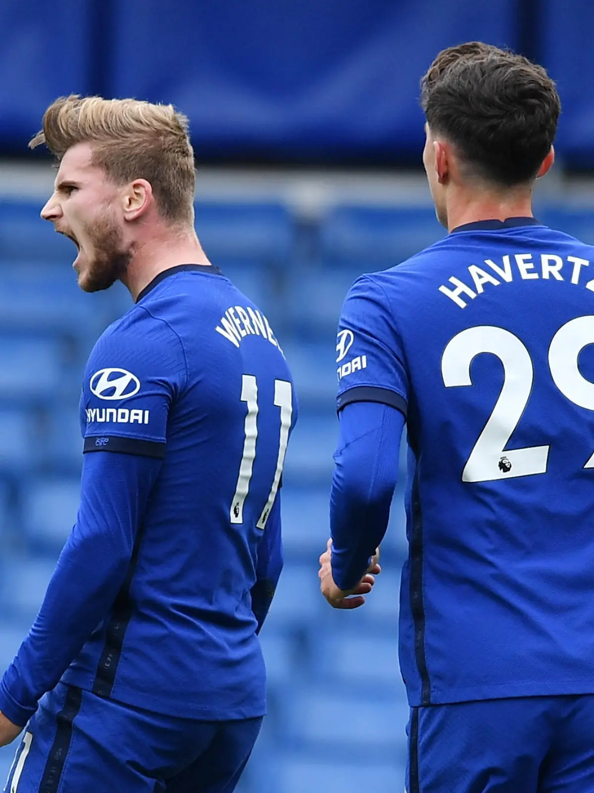 Soccer Football - Premier League - Chelsea v Southampton - Stamford Bridge, London, Britain - October 17, 2020 Chelsea's Timo Werner celebrates scoring their first goal with Kai Havertz Pool via REUTERS/Ben Stansall EDITORIAL USE ONLY. No use with unauthorized audio, video, data, fixture lists, club/league logos or 'live' services. Online in-match use limited to 75 images, no video emulation. No use in betting, games or single club /league/player publications.  Please contact your account representative for further details.
