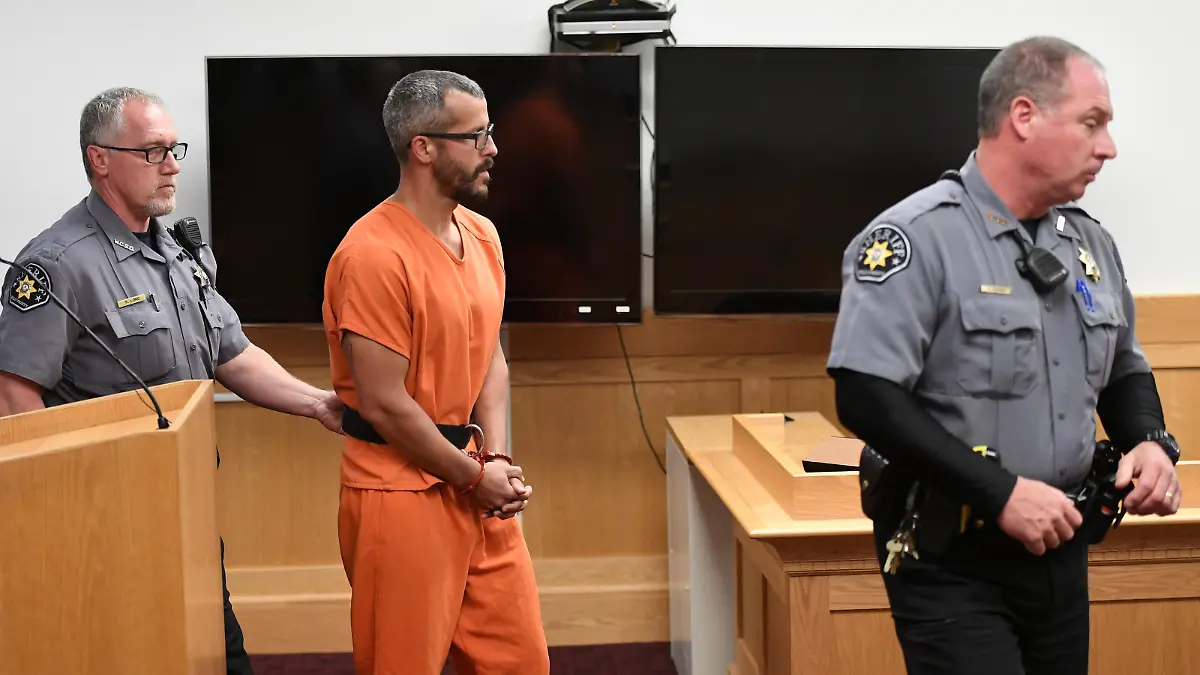 FILE PHOTO: Christopher Watts, facing nine charges including several counts of first-degree murder of his wife and his two young daughters, appears in court for his arraignment hearing at the Weld County Courthouse in Greeley, Colorado, U.S. August 21, 2018.    RJ Sangosti/Pool via REUTERS/File Photo