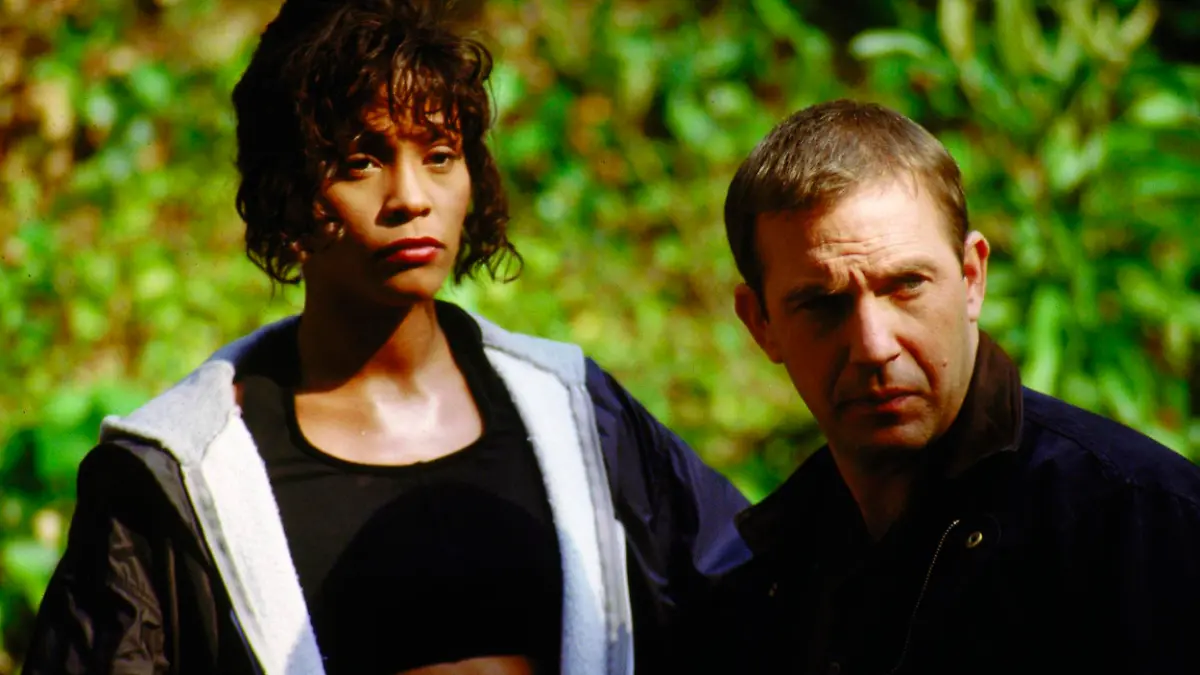 Whitney Houston and Kevin Costner are shown in a scene from their 1992 film "The Bodyguard" in this undated publicity photograph released to Reuters February 11, 2012. Houston, whose soaring voice lifted her to the top of the pop music world but whose personal decline was fueled by decades of drug use, died on Saturday in a Beverly Hills hotel room. She was 48. REUTERS/Courtesy Warner Home Video Copyright 2004/Handout (UNITED STATES - Tags: ENTERTAINMENT OBITUARY) NO SALES. NO ARCHIVES. FOR EDITORIAL USE ONLY. NOT FOR SALE FOR MARKETING OR ADVERTISING CAMPAIGNS. THIS IMAGE HAS BEEN SUPPLIED BY A THIRD PARTY. IT IS DISTRIBUTED, EXACTLY AS RECEIVED BY REUTERS, AS A SERVICE TO CLIENTS