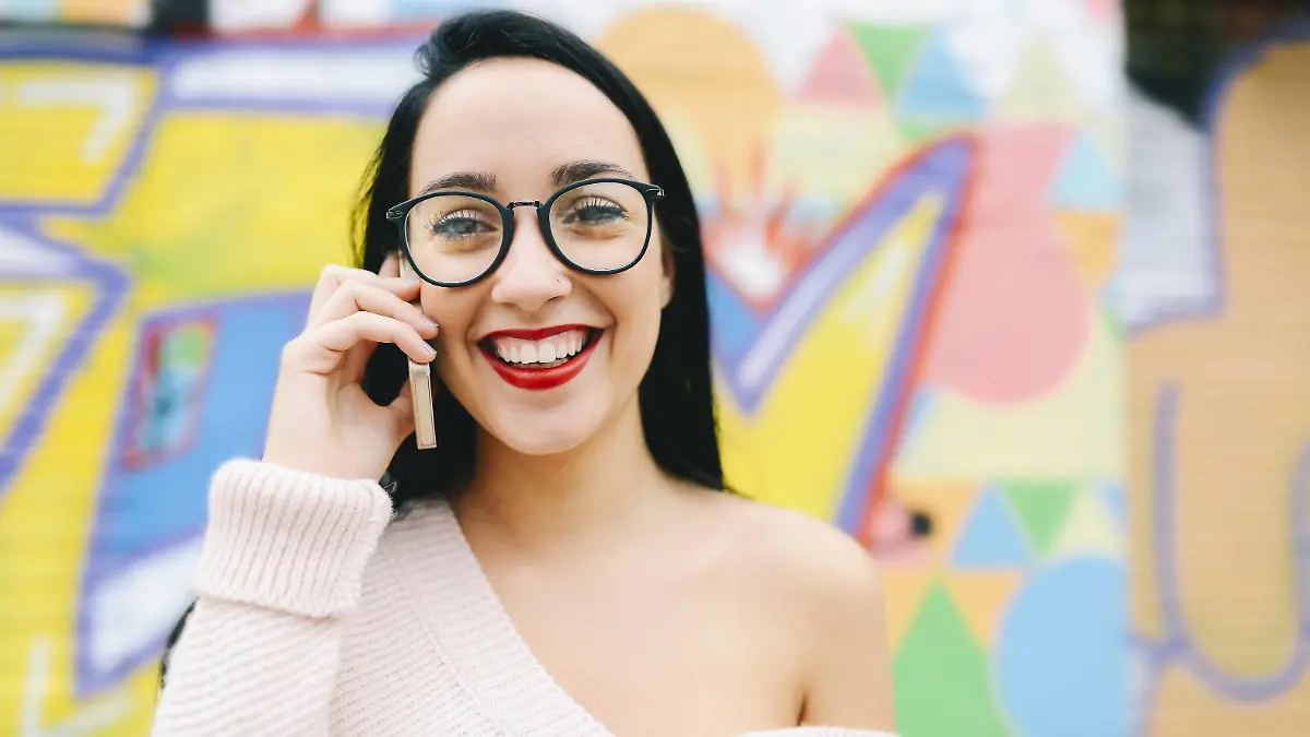 Portrait of happy woman on the phone in front of graffiti wall model released Symbolfoto PUBLICATIONxINxGERxSUIxAUTxHUNxONLY GEMF01292

Portrait of Happy Woman ON The Phone in Front of Graffiti Wall Model released Symbolic image PUBLICATIONxINxGERxSUIxAUTxHUNxONLY GEMF01292  
