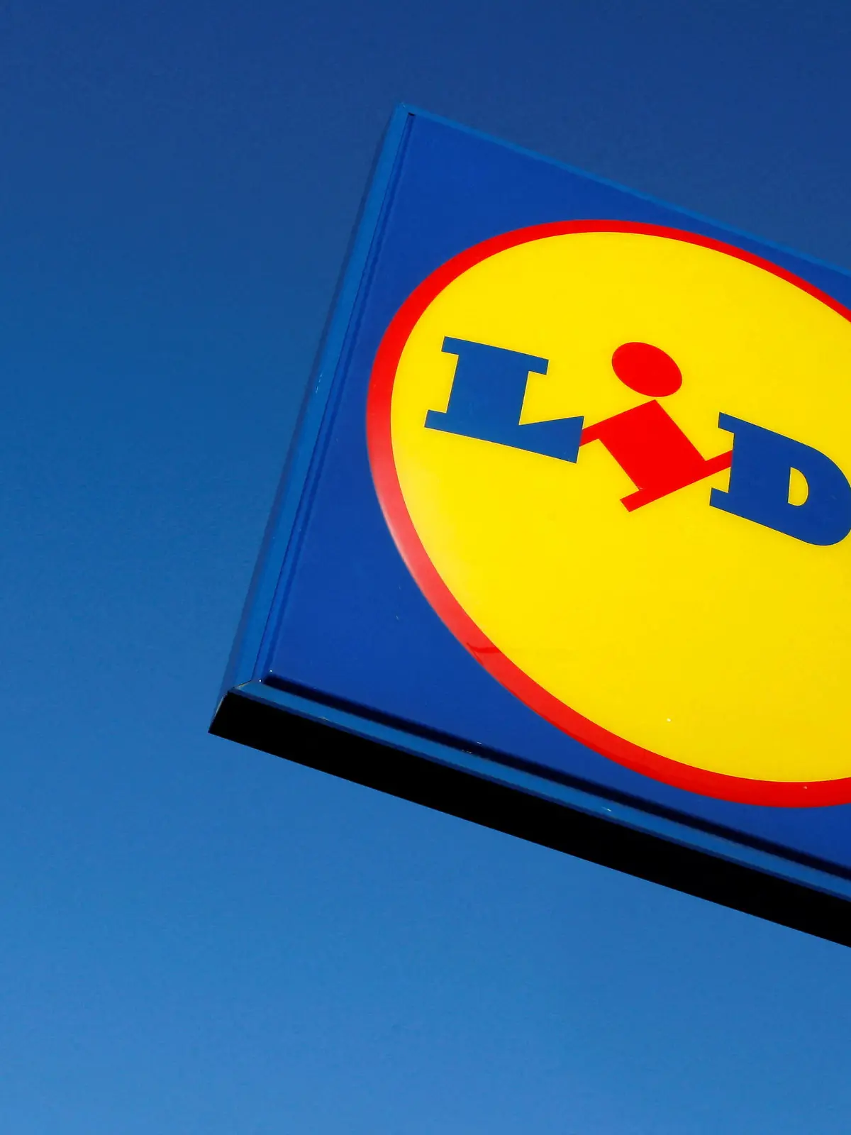 FILE PHOTO: A sign is seen outside a LIDL supermarket in London January 21, 2009.  REUTERS/Stephen Hird/File Photo