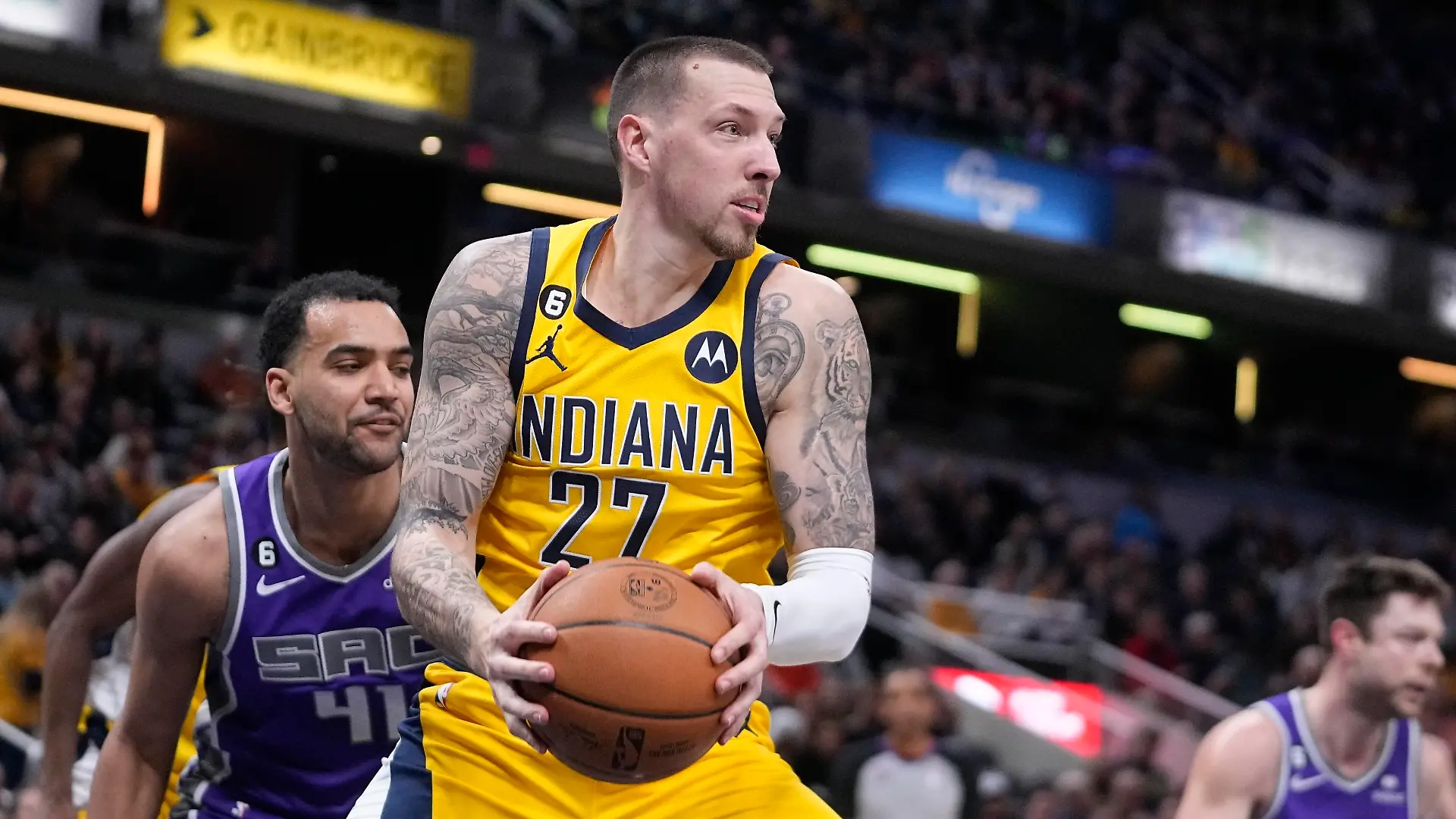 Indiana Pacers' Daniel Theis grabs a rebound during the first half of an NBA basketball game against the Sacramento Kings, Friday, Feb. 3, 2023, in Indianapolis. (AP Photo/Darron Cummings)