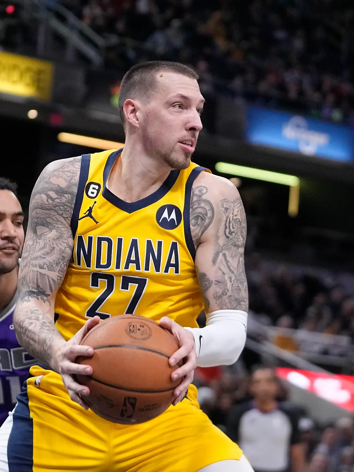 Indiana Pacers' Daniel Theis grabs a rebound during the first half of an NBA basketball game against the Sacramento Kings, Friday, Feb. 3, 2023, in Indianapolis. (AP Photo/Darron Cummings)