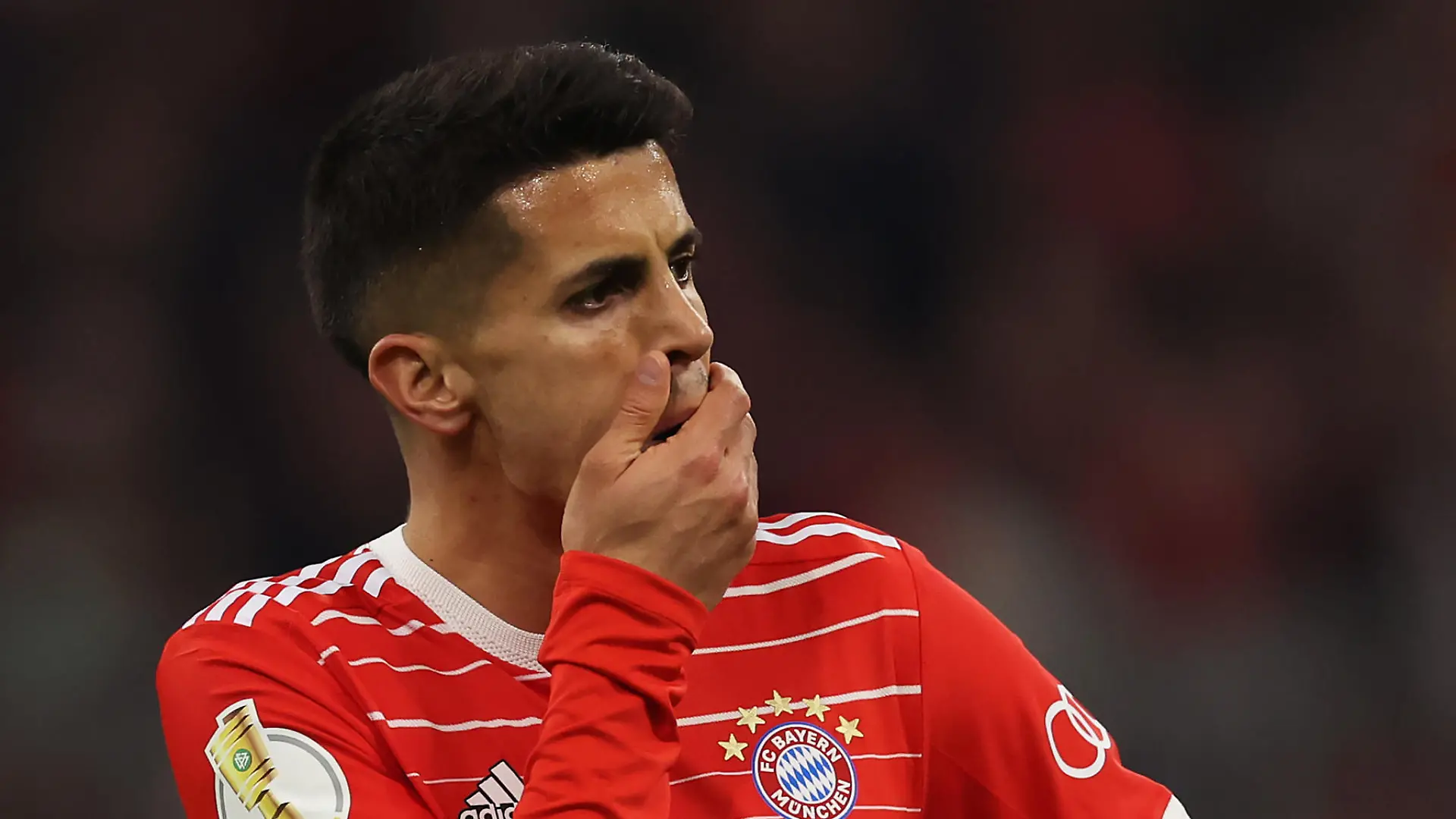 MUNICH, GERMANY - APRIL 04: Joao Cancelo of FC Bayern Munich reacts during the DFB Cup quarterfinal match between FC Bayern München and SC Freiburg at Allianz Arena on April 04, 2023 in Munich, Germany. (Photo by Alexander Hassenstein/Getty Images)