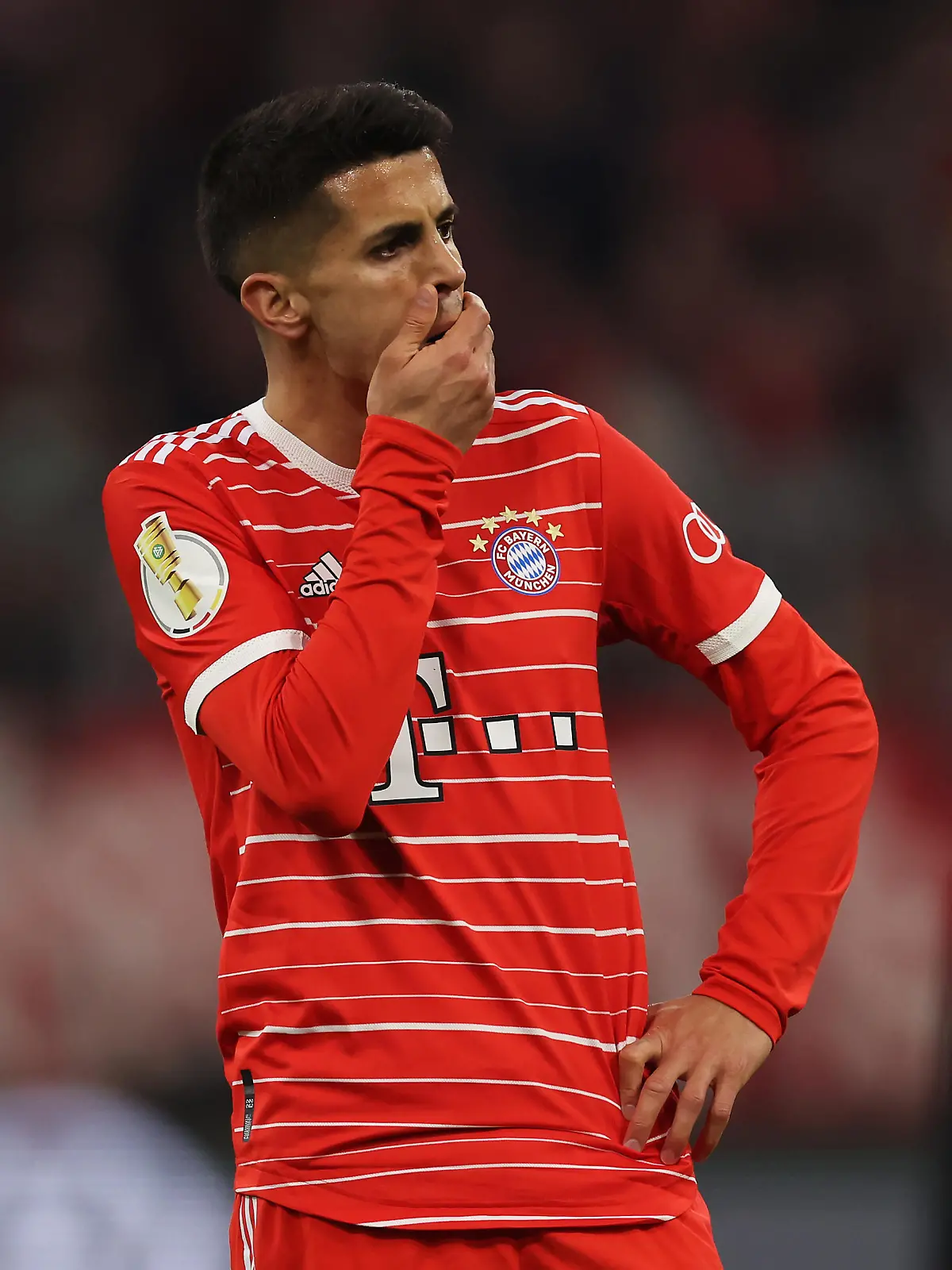 MUNICH, GERMANY - APRIL 04: Joao Cancelo of FC Bayern Munich reacts during the DFB Cup quarterfinal match between FC Bayern München and SC Freiburg at Allianz Arena on April 04, 2023 in Munich, Germany. (Photo by Alexander Hassenstein/Getty Images)