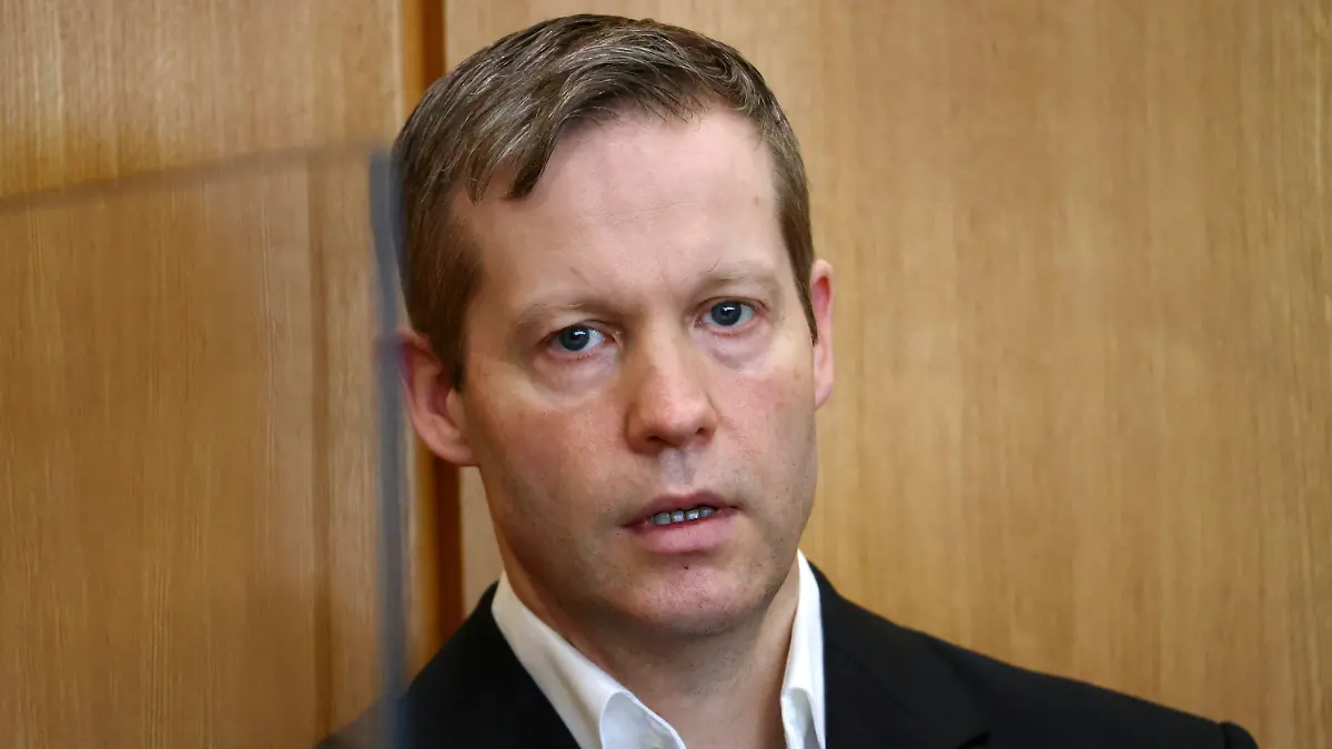 Stephan Ernst, who is accused of murdering politician Walter Luebcke for his trial at the Oberlandesgericht Frankfurt courthouse, in Frankfurt, Germany, Wednesday, August 5, 2020. Stephan Ernst acknowledged that he filed the fatal shot in a statement by his lawyer to the Frankfurt state court on Wednesday, news agency dpa reported. (Kai Pfaffenbach/Pool via AP)