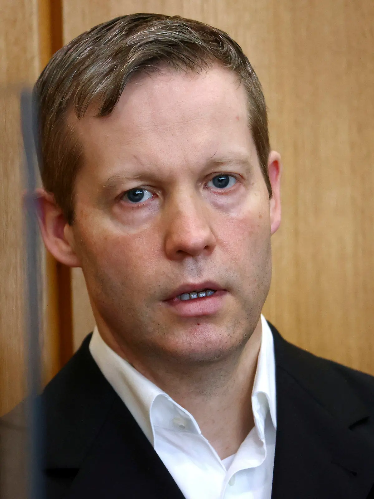 Stephan Ernst, who is accused of murdering politician Walter Luebcke for his trial at the Oberlandesgericht Frankfurt courthouse, in Frankfurt, Germany, Wednesday, August 5, 2020. Stephan Ernst acknowledged that he filed the fatal shot in a statement by his lawyer to the Frankfurt state court on Wednesday, news agency dpa reported. (Kai Pfaffenbach/Pool via AP)