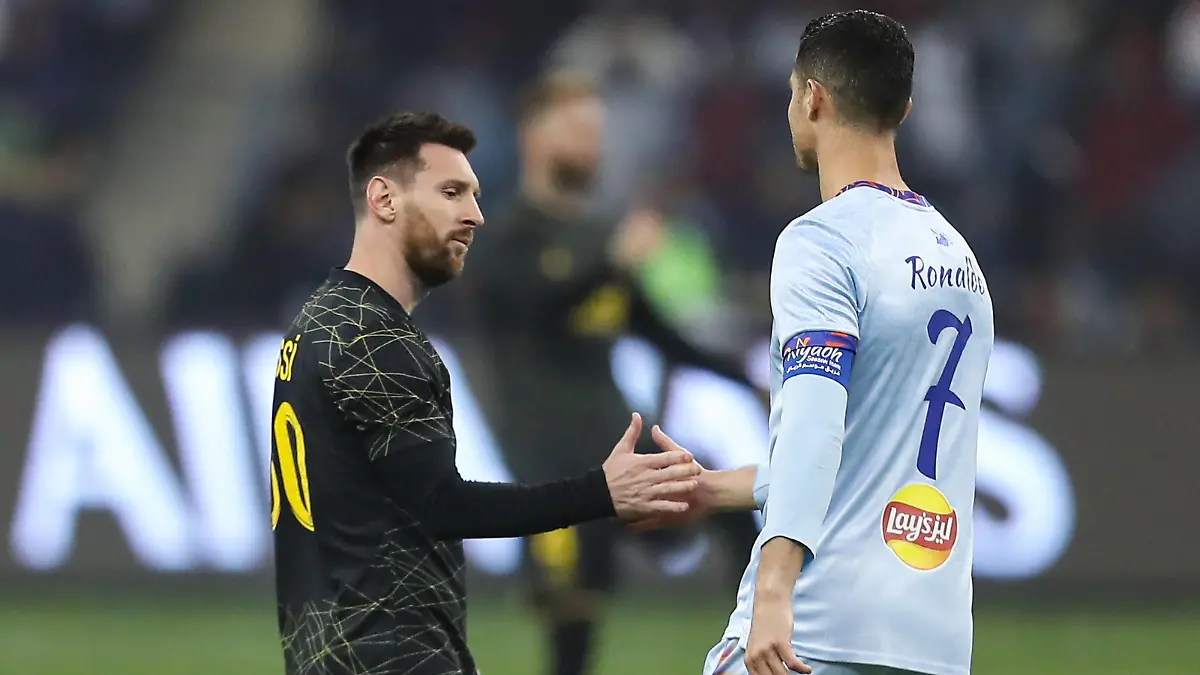 Riyadh All-Star XI vs Paris Saint-Germain FC Lionel Messi L and Cristiano Ronaldo great each other prior Riyadh All-Star XI vs Paris Saint-Germain FC at King Fahd Stadium on January 19, 2023 in Riyadh, Saudi Arabia. Riyadh King Fahd Stadium Saudi Arabia PUBLICATIONxNOTxINxJPNxUK Copyright: xStringerx 2023.01.19_PSI03235.GS.WEST_HOA_001350-2