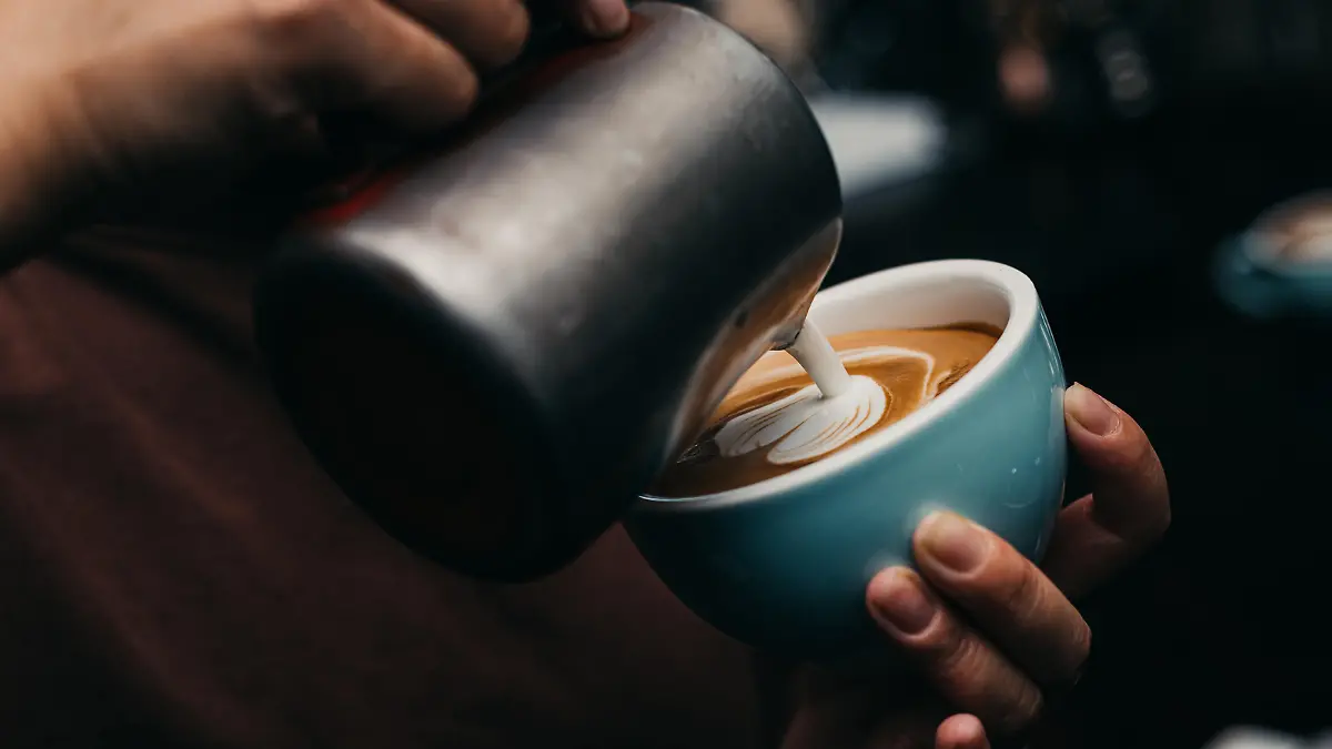 Barista Pouring Latte Art Photography