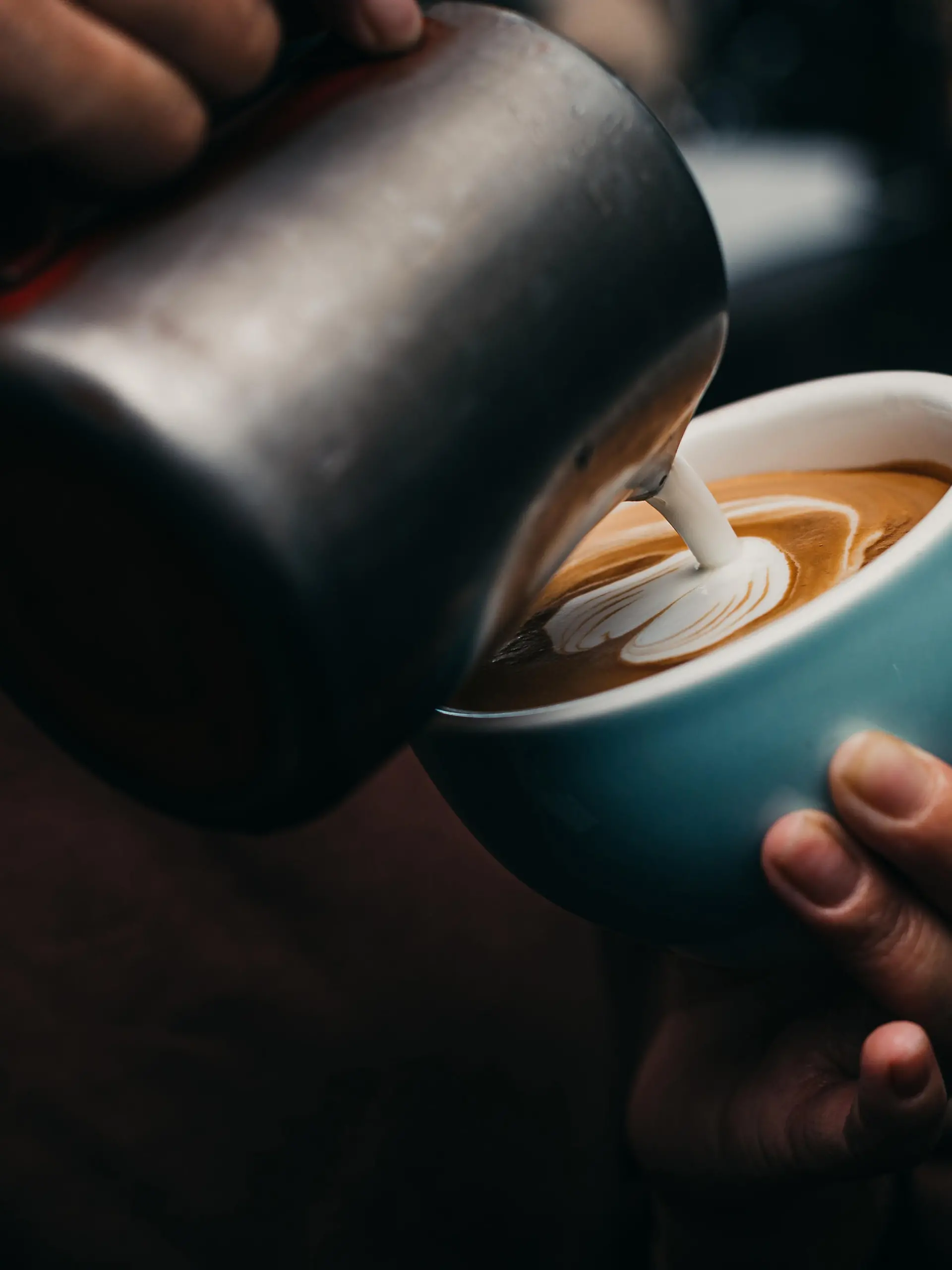 Barista Pouring Latte Art Photography