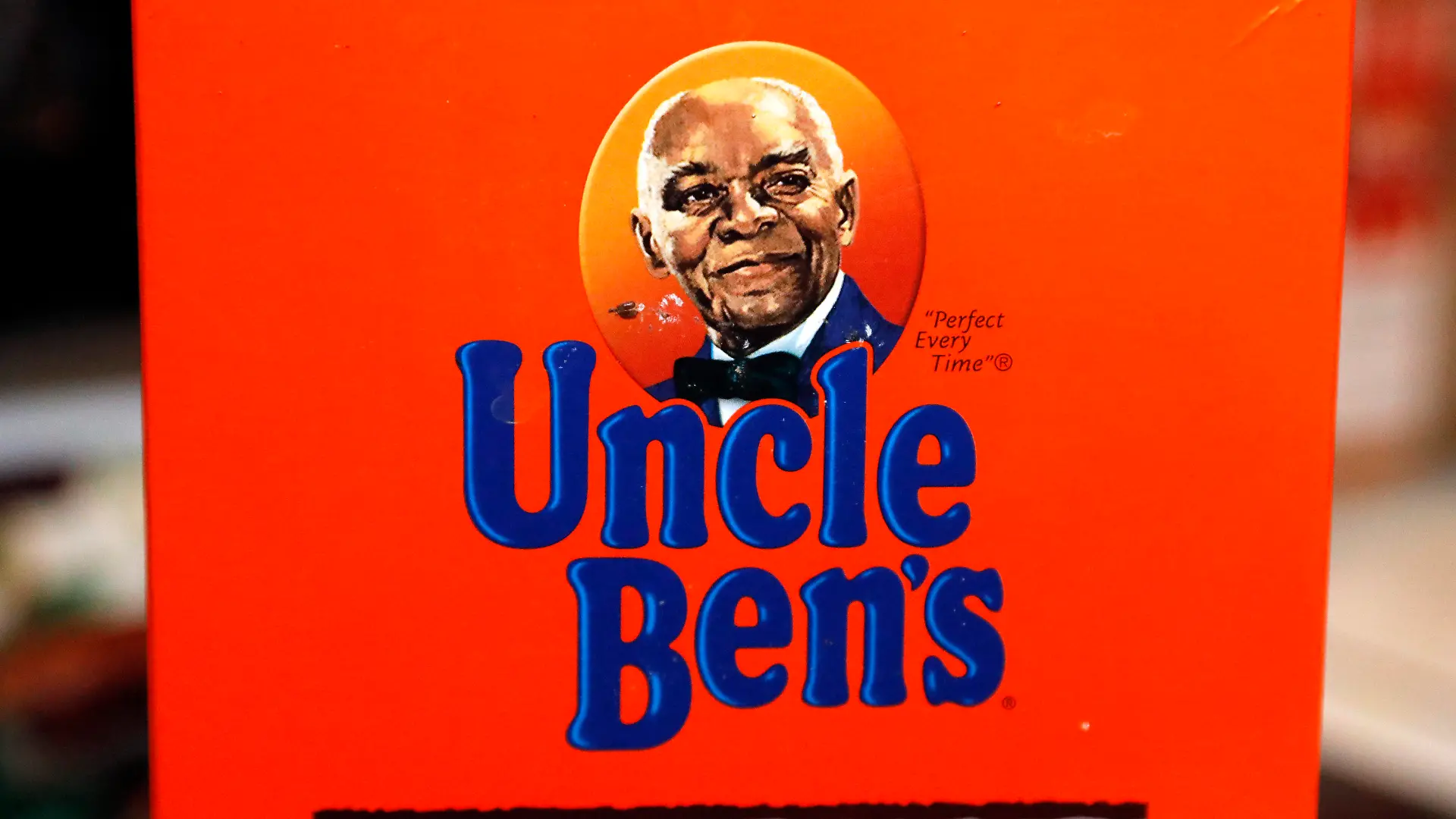 The portrait of "Uncle Ben's" is portrayed on a box of rice Thursday, June 18, 2020 in Jackson, Miss. The Uncle Ben's rice brand is getting a new name: Ben's Original. Parent firm Mars Inc. unveiled the change Wednesday, Sept. 23, 2020 for the 70-year-old brand, the latest company to drop a logo criticized as a racial stereotype. Packaging with the new name will hit stores next year. (AP Photo/Rogelio V. Solis)