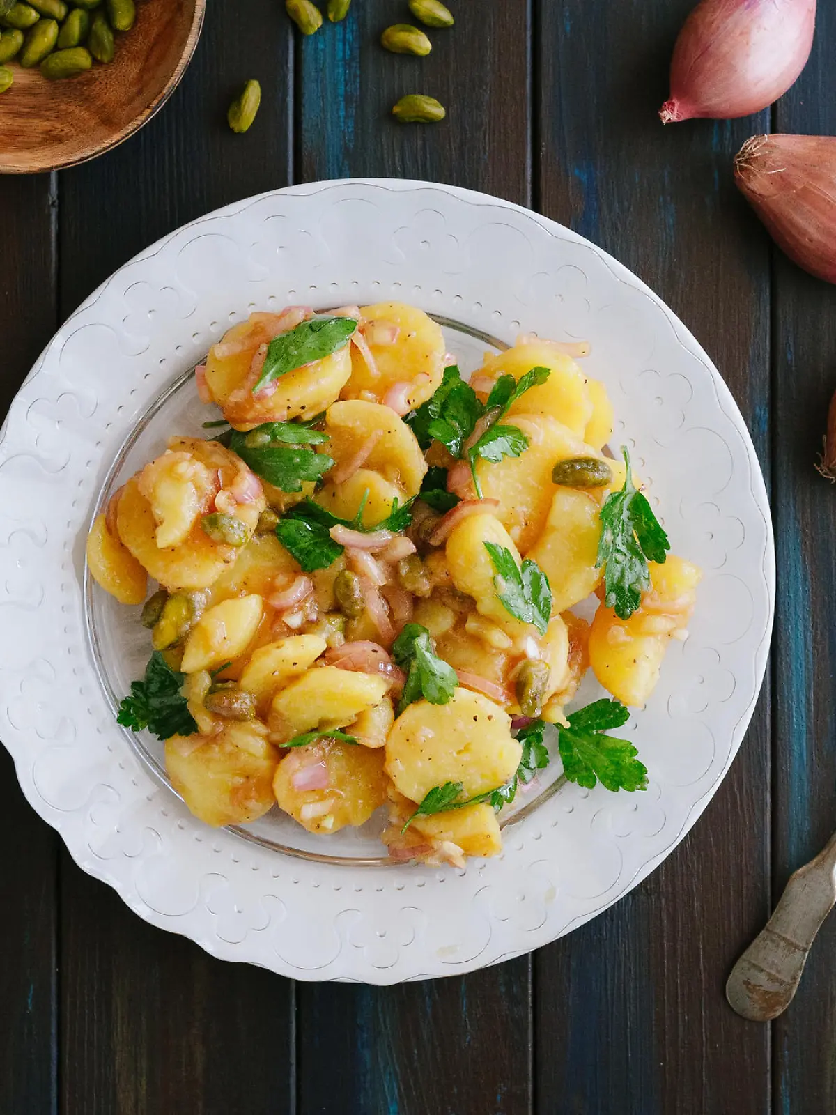 Potato salad with pistachios and onions