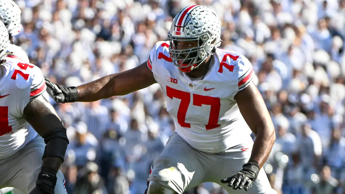 Ohio State offensive lineman Paris Johnson Jr. (77) looks for someone to block against Penn State during an NCAA college football game, Saturday, Oct. 29, 2022, in State College, Pa. (AP Photo/Barry Reeger)