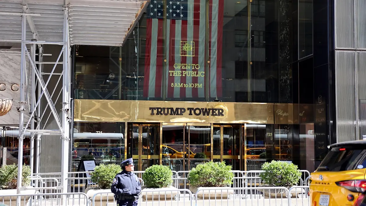 New York, NY - Former President Donald Trump landed in New York on Monday afternoon ahead of his historic arraignment in the Stormy Daniels hush money case on Tuesday.
It will make Trump the first former U.S. president to face criminal charges when he is arraigned, fingerprinted and photographed at the downtown Manhattan courthouse.
Trump Force One touched down at LaGuardia Airport just after 3.30pm following his flight from Mar-a-Lago, where supporters greeted him as his motorcade swept out of the gates.
The former president will spend the night at Trump Tower before his arraignment at around 2.15pm on Tuesday, where he could be facing 30 counts of business fraud. 
Here are some general views outside the Trump Tower ahead of tomorrow's historic arraignment.
Pictured: Donald Trump, Trump Tower 
BACKGRID USA 3 APRIL 2023 
BYLINE MUST READ: T.JACKSON / BACKGRID


