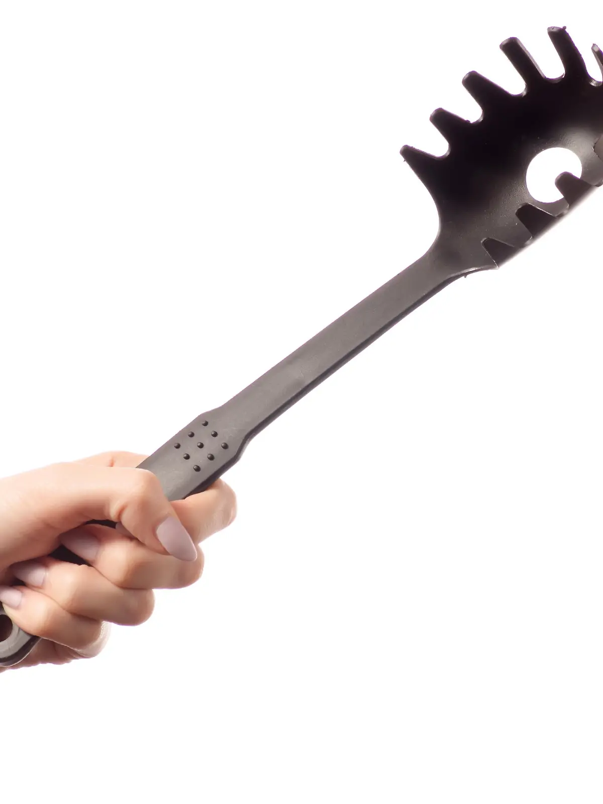 Spaghetti spatula in hands isolated on white background isolation