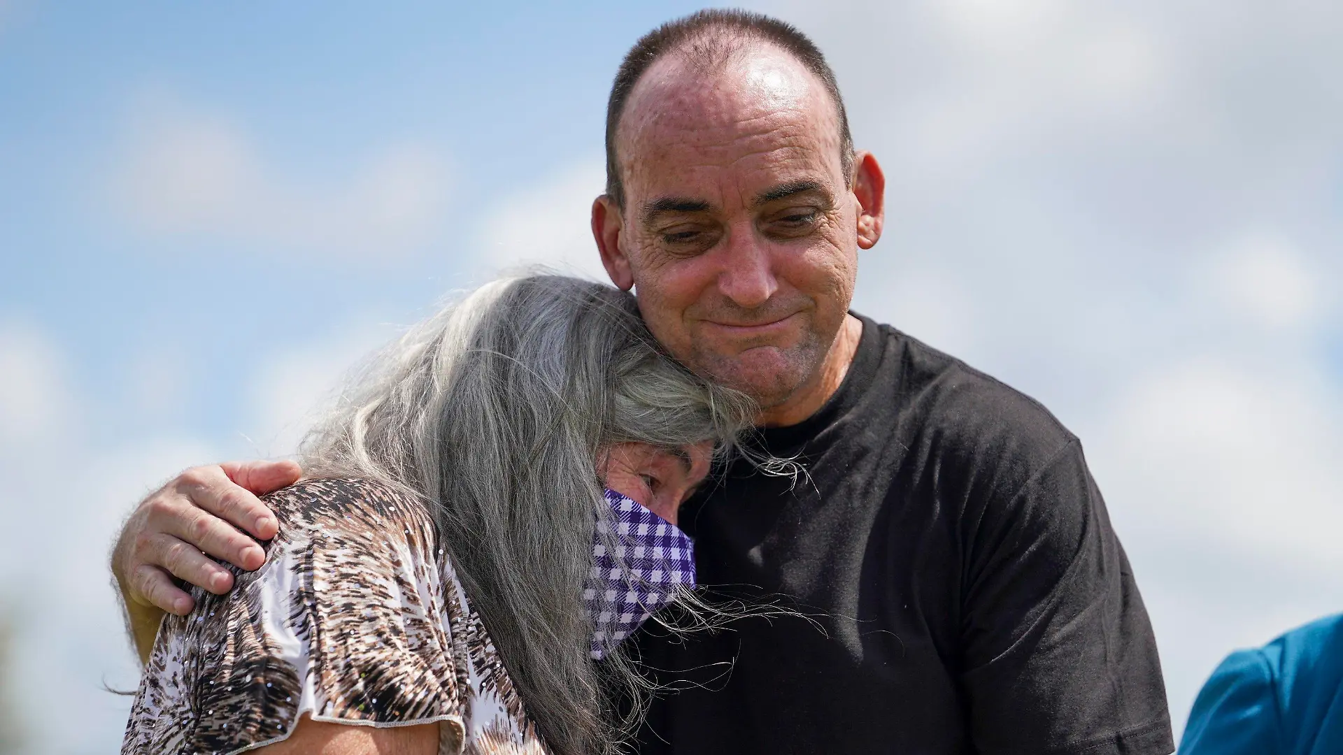 Robert Duboise hugs his mother after being released from prison Thursday, Aug. 27, 2020, in Bowling Green, Fla. Duboise, who spent the last 37 years in prison on a rape and murder charge, was ordered released after officials discovered new evidence that proved his innocence. (Martha Asencio-Rhine/Tampa Bay Times via AP)