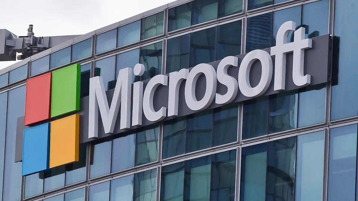 FILE - This April 12, 2016 file photo shows the Microsoft logo in Issy-les-Moulineaux, outside Paris, France. Ongoing demand for Microsoft's cloud computing services help softened the blow of the coronavirus pandemic on the software giant's other products during the first three months of the year. The company on Wednesday, April 29, 2020 reported fiscal third-quarter profit of $10.75 billion, up 22% from the same period last year. Net income of $1.40 per share beat Wall Street expectations of $1.27 a share. (AP Photo/Michel Euler, File)
