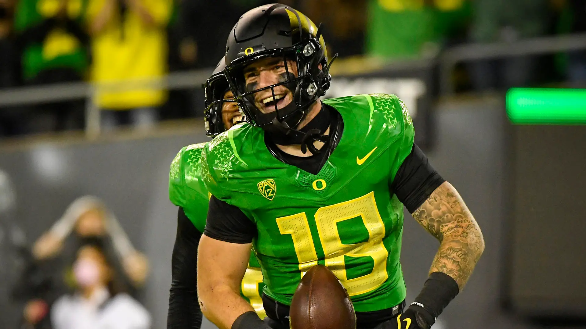 FILE - Oregon Ducks tight end Spencer Webb (18) is shown after a touchdown during an NCAA college football game against Arizona on Sept. 25, 2021, in Eugene, Ore. Webb has died after falling and striking his head on rock slides at a popular swimming lake near Eugene, Oregon. Authorities say the 22-year-old was unresponsive when they arrived at Triangle Lake on Wednesday, July 13, 2022, and found him about 100 yards down a steep trail. (AP Photo/Andy Nelson, File)