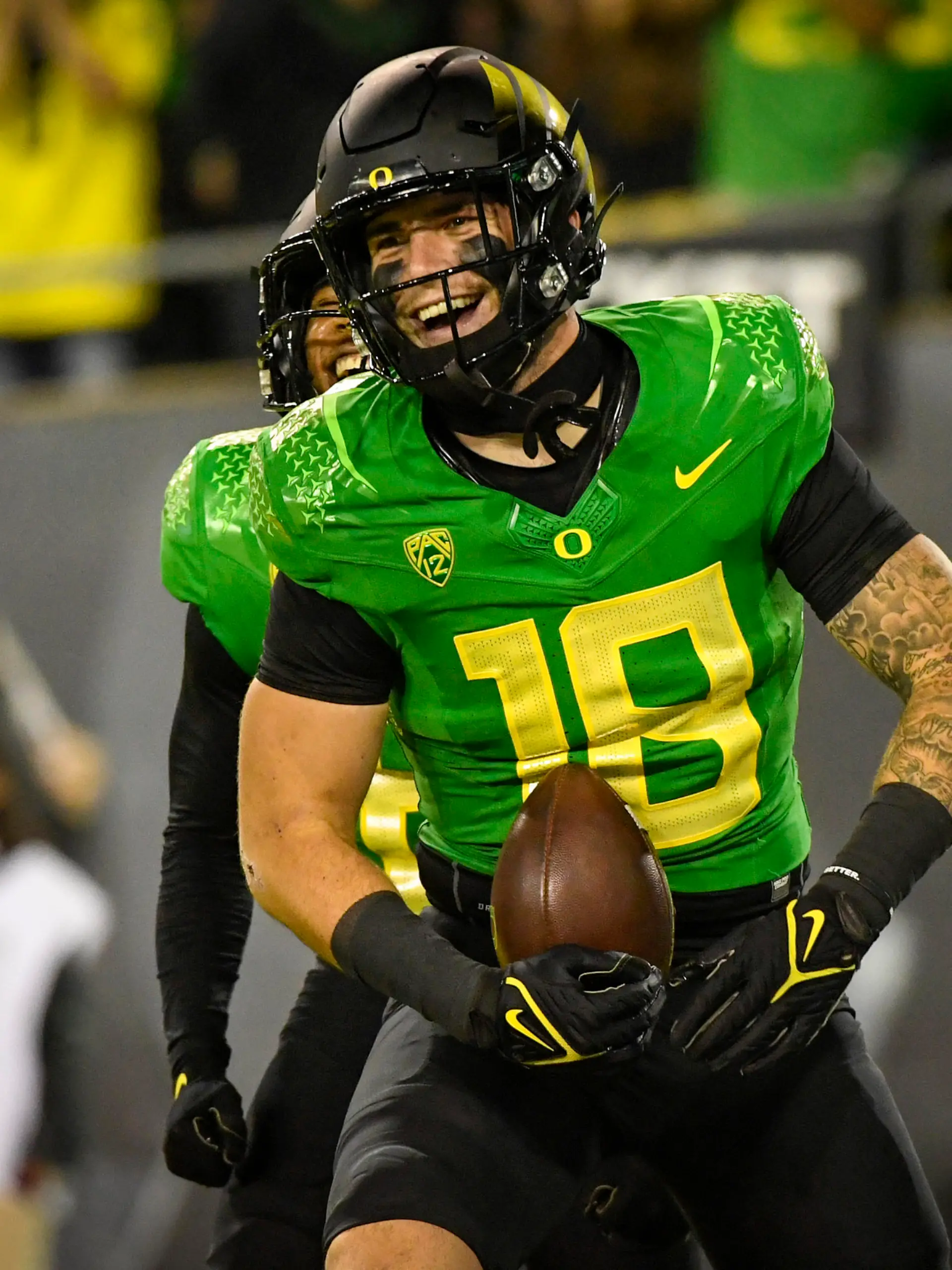FILE - Oregon Ducks tight end Spencer Webb (18) is shown after a touchdown during an NCAA college football game against Arizona on Sept. 25, 2021, in Eugene, Ore. Webb has died after falling and striking his head on rock slides at a popular swimming lake near Eugene, Oregon. Authorities say the 22-year-old was unresponsive when they arrived at Triangle Lake on Wednesday, July 13, 2022, and found him about 100 yards down a steep trail. (AP Photo/Andy Nelson, File)
