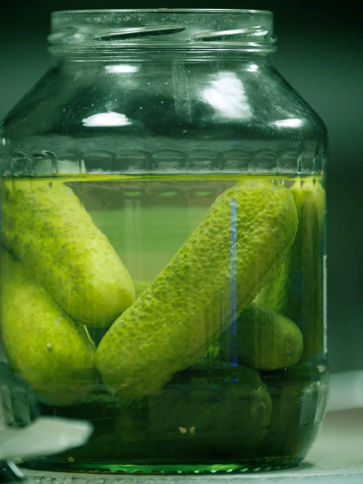 Close-up shot of a pickle jar.