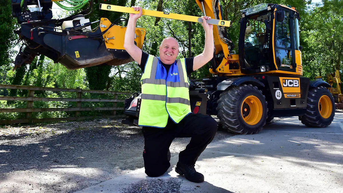 ÃMr PotholeÅ - the worldÅs best-known pothole campaigner Ä has hailed a brand new weapon designed to do battle with the national scourge. The 60-year-old former Mayor of Brackley in Northamptonshire - whose real name is Mark Morell - was so fed up with the state of the countryÅs roads he started his own personal crusade to improve the condition of the highways in 2013. Now heÅs been behind the controls of JCBÅs revolutionary pothole fixing machine the PotholePro Ä and says itÅs just what the country has been waiting for. The brand new innovation from JCB fixes a pothole in just eight minutes - four times quicker than traditional methods and at half the cost., Credit:Avalon / Avalon