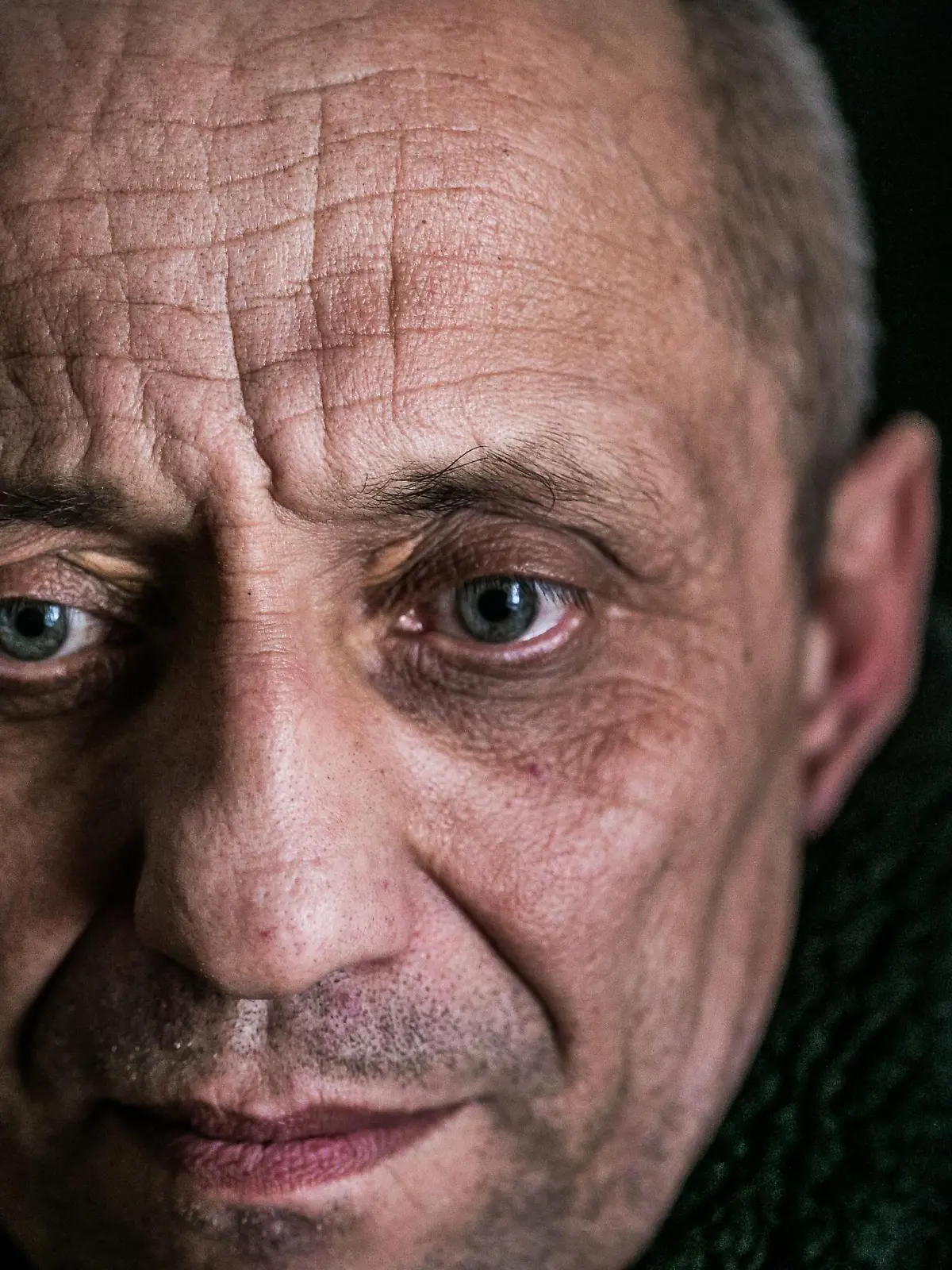 A picture taken on December 13, 2017 shows serial killer Mikhail Popkov in Irkutsk. - A Siberian policeman who raped and killed women after offering them late-night rides was found guilty of dozens more murders on December 10, 2018, making him Russia's most prolific serial killer of recent times. A court in the city of Irkutsk found Mikhail Popkov guilty of 56 murders between 1992 and 2007, sentencing him to a second life term. He was already in prison after being convicted of killing 22 women in 2015. (Photo by Anton Klimov / AFP)        (Photo credit should read ANTON KLIMOV/AFP via Getty Images)