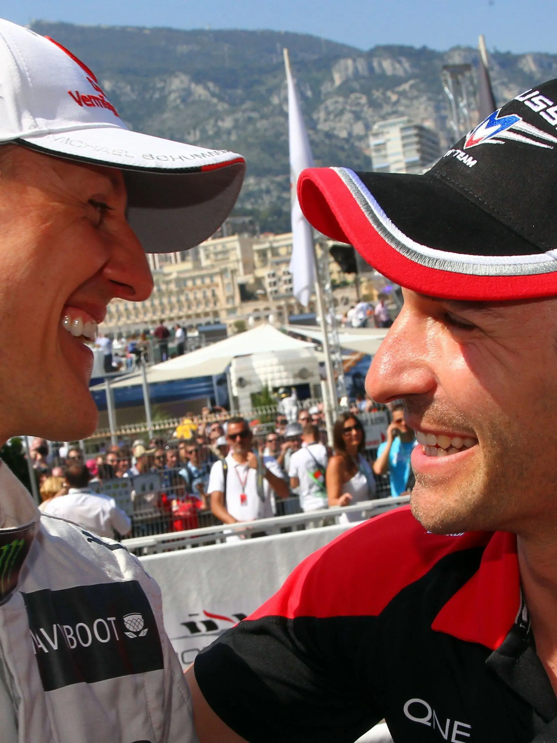 German Formula One driver Timo Glock (R) of Marussia congratulates German Formula One driver Michael Schumacher of Mercedes AMG (L)at the F1 race track of Monte Carlo, Monaco, 26 May 2012. Schumacher clocked the fastest time in the Qualifying session. The Grand Prix will take place on 27 May. Photo: Jens Buettner dpa +++(c) dpa - Bildfunk+++