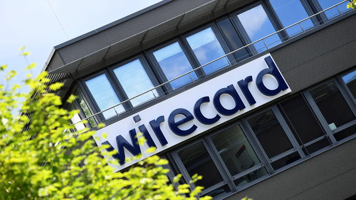 FILE PHOTO: The logo of Wirecard AG, an independent provider of outsourcing and white label solutions for electronic payment transactions, is pictured at its headquarters in Aschheim near Munich, Germany, July 1, 2020. REUTERS/Andreas Gebert/File Photo