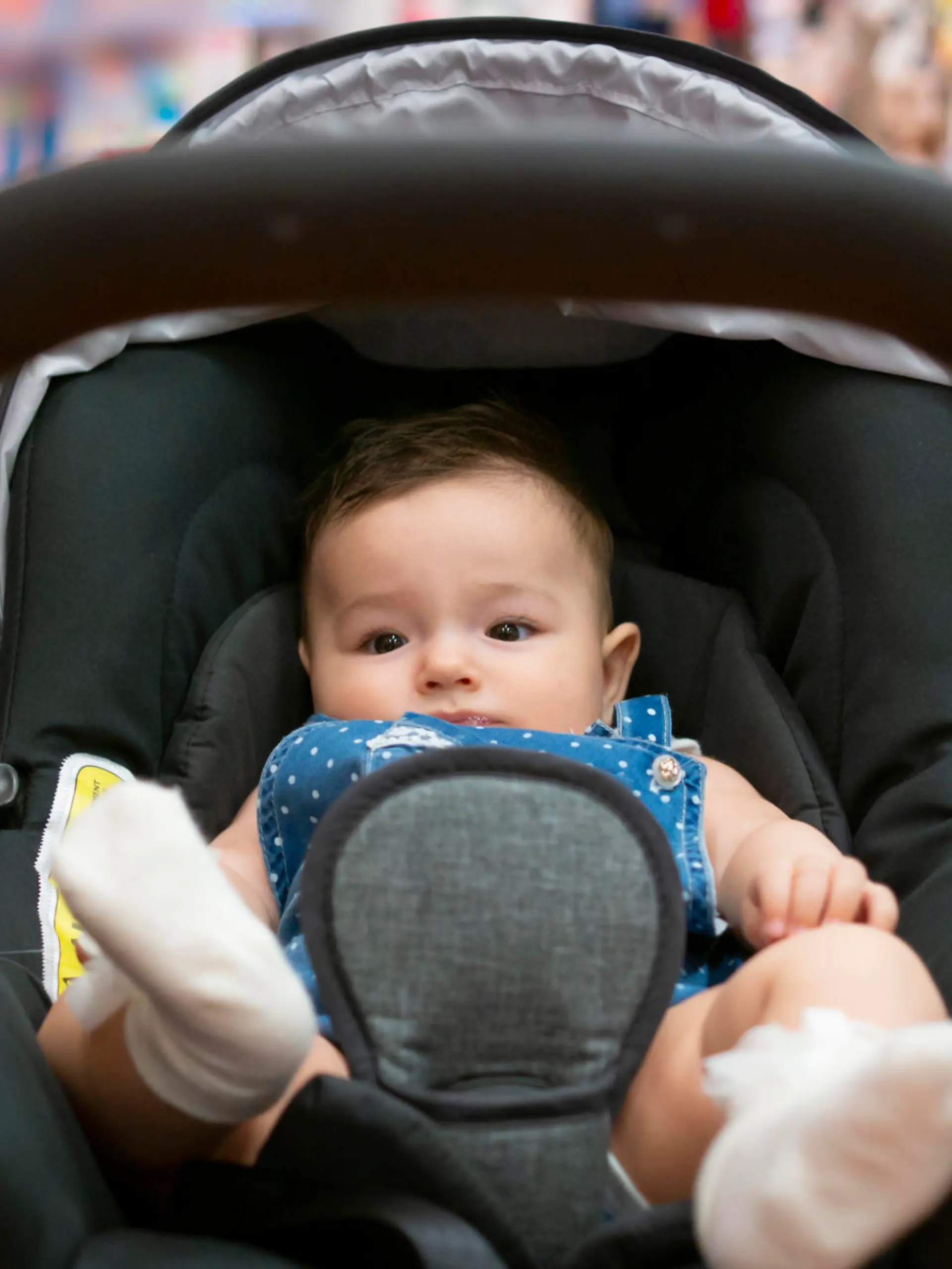Kind im Kinderwagen