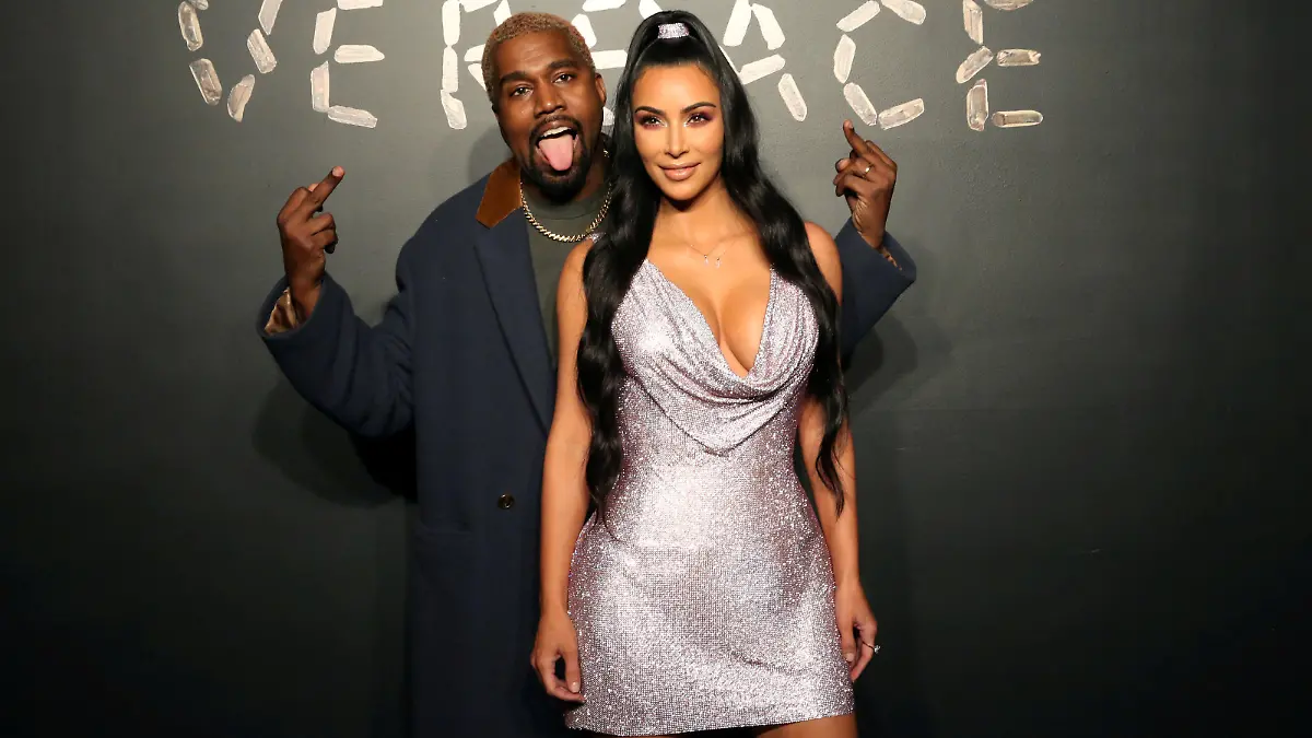 FILE PHOTO: Kanye West and Kim Kardashian pose for a photo before attending the Versace presentation in New York, U.S. December 2, 2018. REUTERS/Allison Joyce/File Photo
