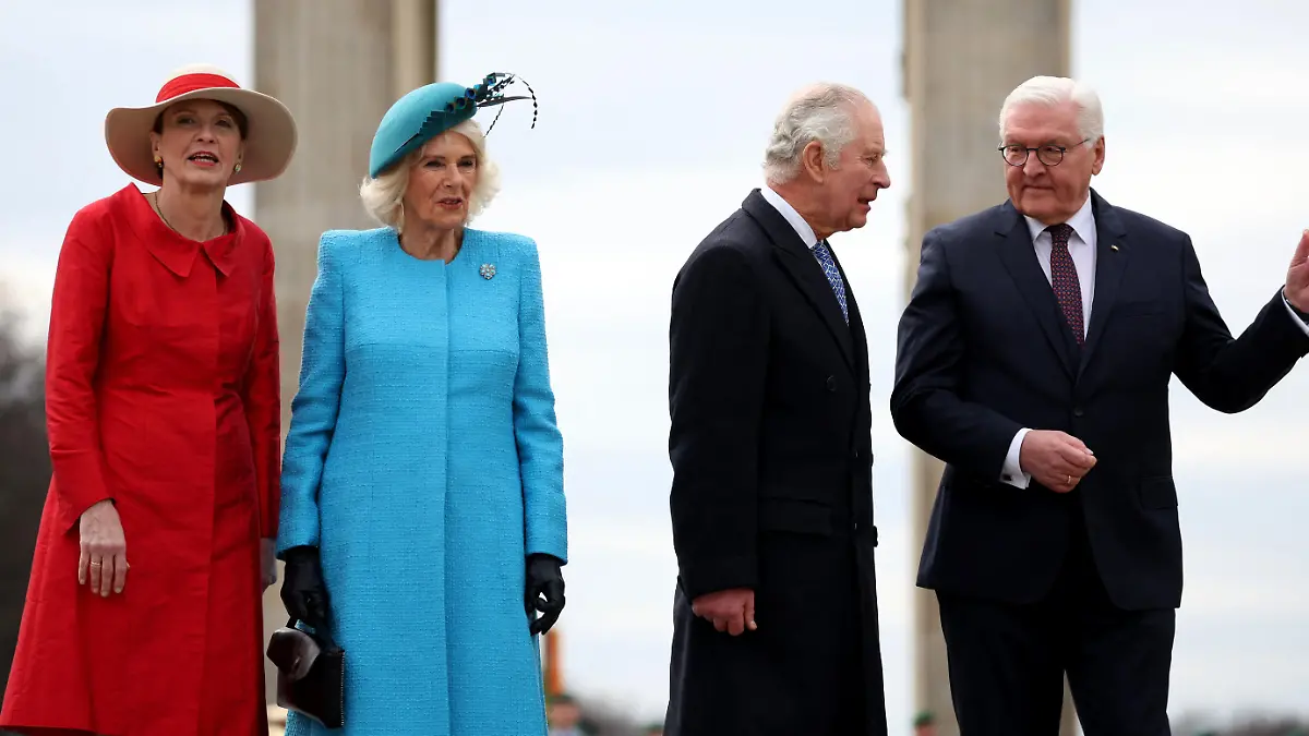 (L-R) The German President's wife Elke Buedenbender, Britain's Camilla, Queen Consort, Britain's King Charles III and German President Frank-Walter Steinmeier attend a ceremonial welcome at Brandenburg Gate in Berlin, on March 29, 2023. - Britain's King Charles III began his first state visit, having postponed a trip to France due to widespread political protests. Charles will undertake engagements in the German capital and in Brandenburg before heading to Hamburg during the three-day tour. (Photo by Ronny HARTMANN / AFP) (Photo by RONNY HARTMANN/AFP via Getty Images)