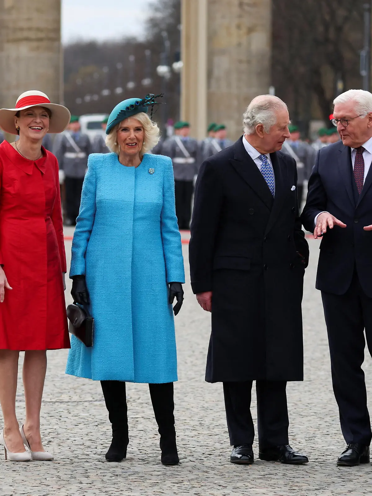 German President Frank-Walter Steinmeier, his wife Elke Buedenbender and Britain's King Charles and Camilla, the Queen Consort attend a welcome ceremony with military honors at Pariser Platz square in front of Brandenburg Gate in Berlin, Germany, March 29, 2023. REUTERS/Phil Noble