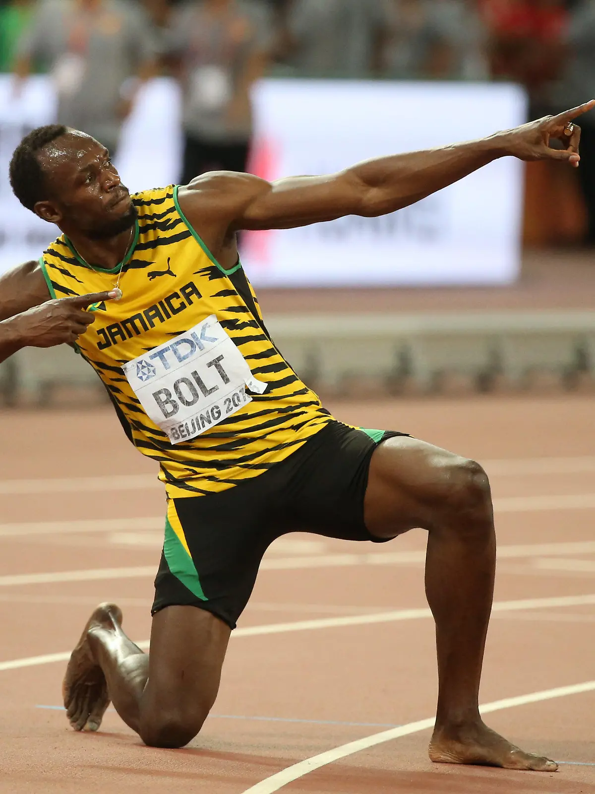 Usain Bolt of Jamaica celebrates after winning the gold medal in the men's 200m final at the Beijing 2015 IAAF World Championships at the National Stadium, also known as Bird's Nest, in Beijing, China, 27 August 2015. Photo: Christian Charisius/dpa +++(c) dpa - Bildfunk+++