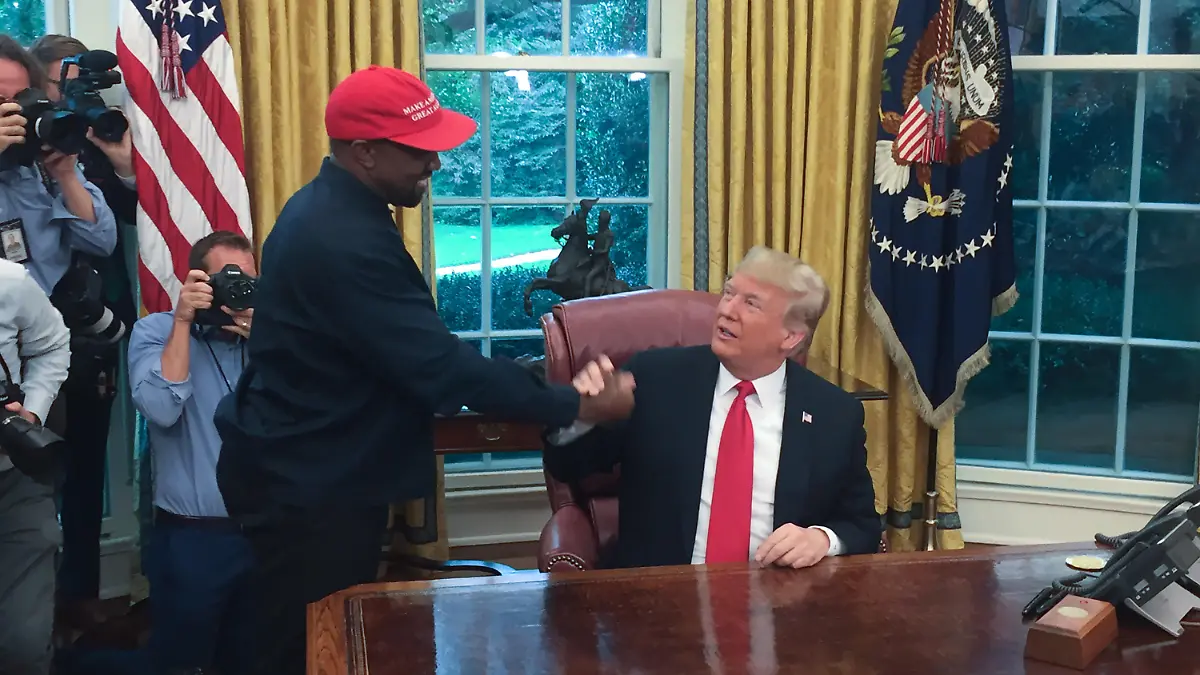 (Files) in this file photo US President Donald Trump meets with rapper Kanye West in the Oval Office of the White House in Washington, DC, October 11, 2018. - Rapper Kanye West, who has been outspoken in his support for President Donald Trump, now says he's going to focus on his music and fashion after being "used" in the world of politics, October 30, 2018. (Photo by SEBASTIAN SMITH / AFP)        (Photo credit should read SEBASTIAN SMITH/AFP via Getty Images)