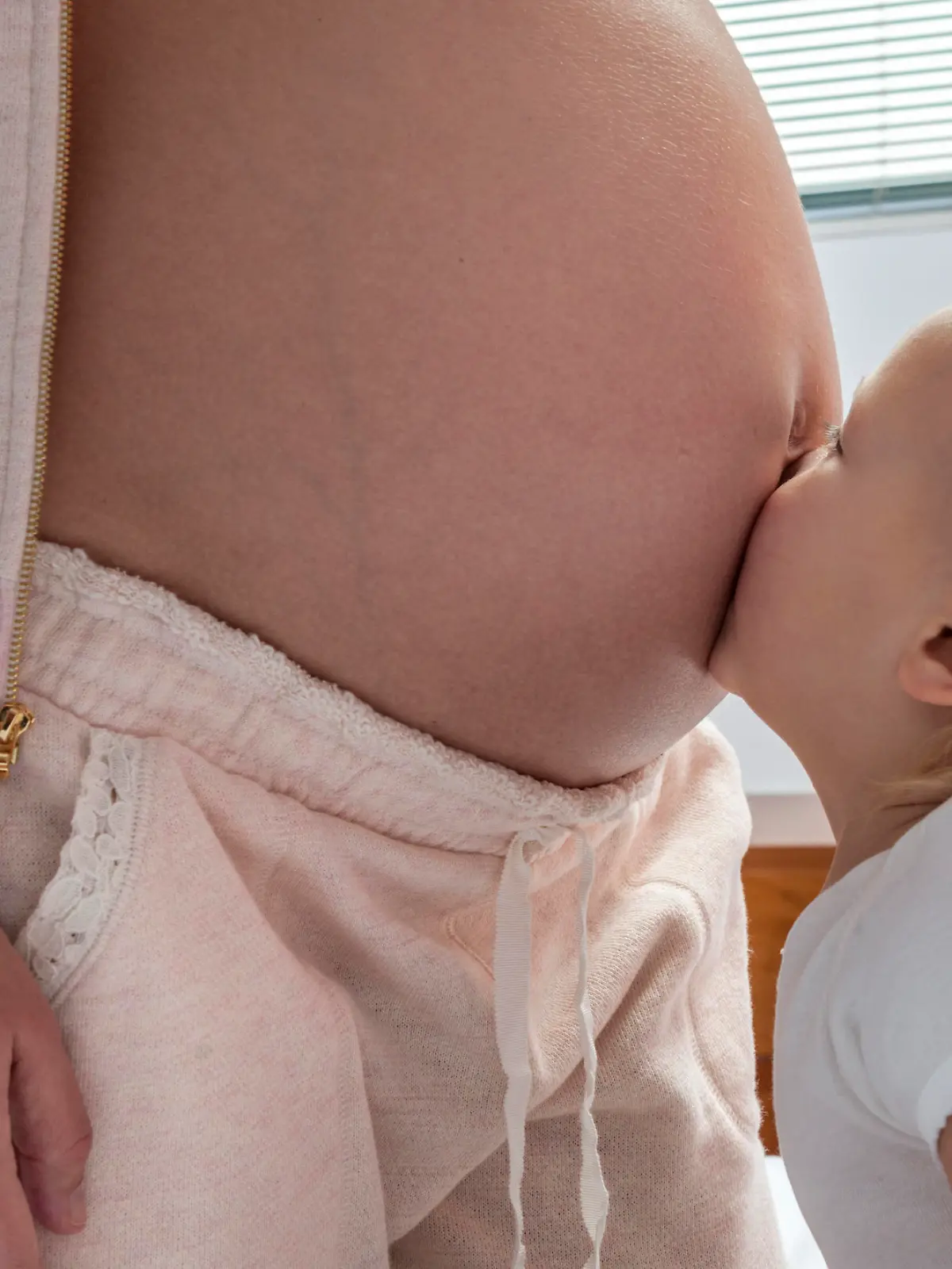 Schwangere mit Baby