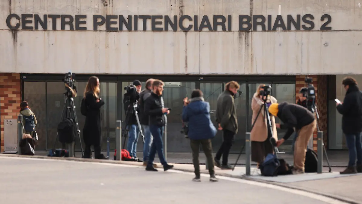 Members of the media stand in front of the entrance of Brians 2 prison where Brazilian soccer player Dani Alves was taken after a judge ordered him to be jailed on remand without bail over an alleged sexual assault of a woman in Barcelona, Spain February 21, 2023. REUTERS/Nacho Doce