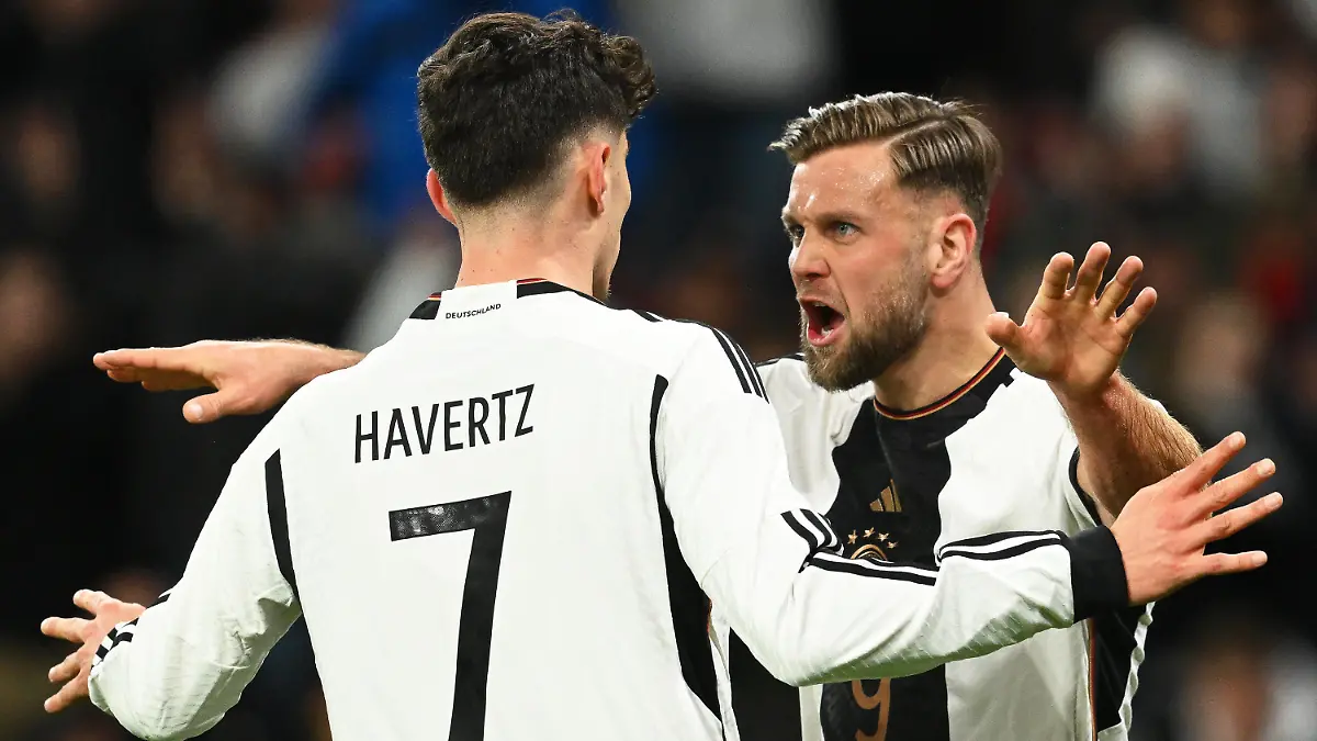 dpatopbilder - 25.03.2023, Rheinland-Pfalz, Mainz: Fußball: Länderspiele, Deutschland - Peru, Mewa Arena. Deutschlands Niclas Füllkrug (r) jubelt mit Teamkollege Kai Havertz nach seinem Treffer zum 1:0. Foto: Arne Dedert/dpa +++ dpa-Bildfunk +++