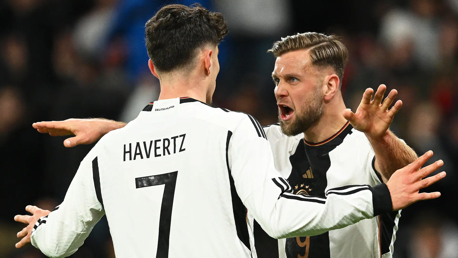 dpatopbilder - 25.03.2023, Rheinland-Pfalz, Mainz: Fußball: Länderspiele, Deutschland - Peru, Mewa Arena. Deutschlands Niclas Füllkrug (r) jubelt mit Teamkollege Kai Havertz nach seinem Treffer zum 1:0. Foto: Arne Dedert/dpa +++ dpa-Bildfunk +++