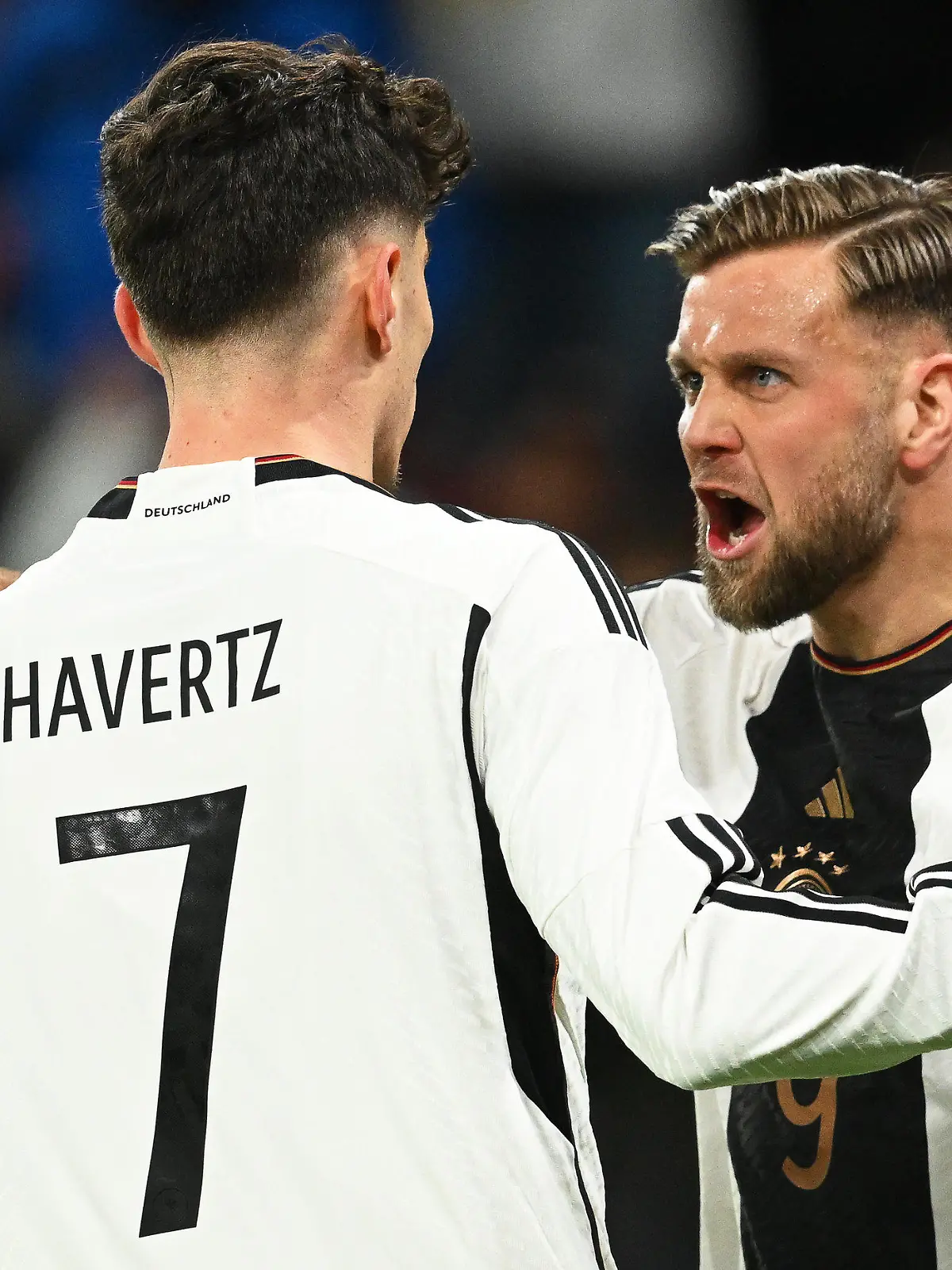 dpatopbilder - 25.03.2023, Rheinland-Pfalz, Mainz: Fußball: Länderspiele, Deutschland - Peru, Mewa Arena. Deutschlands Niclas Füllkrug (r) jubelt mit Teamkollege Kai Havertz nach seinem Treffer zum 1:0. Foto: Arne Dedert/dpa +++ dpa-Bildfunk +++