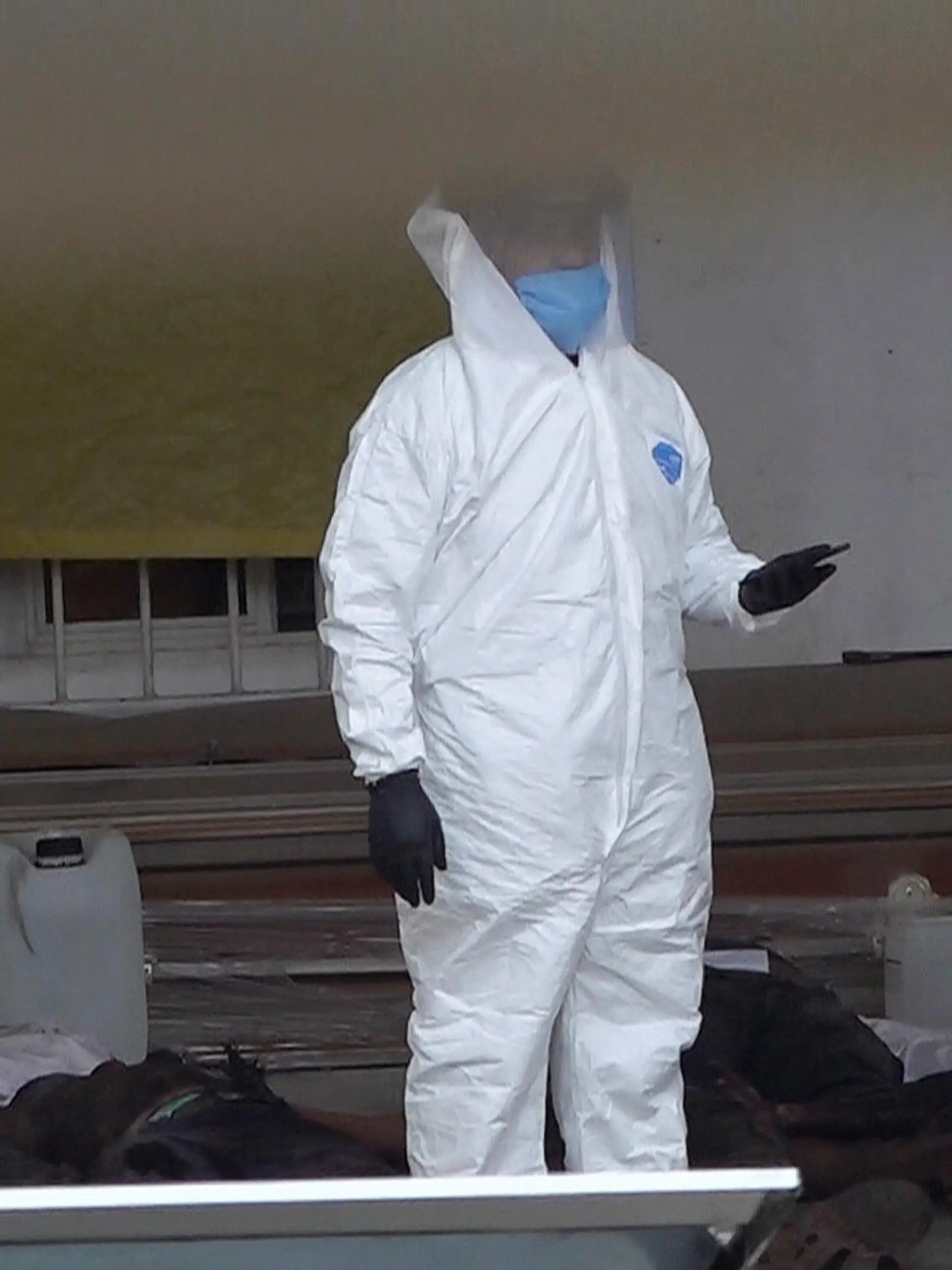 SENSITIVE MATERIAL. THIS IMAGE MAY OFFEND OR DISTURB Forensic technicians stand by bodies of inhabitants of an indigenous village, killed by assailants in an area that has been plagued by local disputes, at a funeral parlor in Salina Cruz, in Oaxaca state, Mexico June 22, 2020. REUTERS/Jose de Jesus Cortes