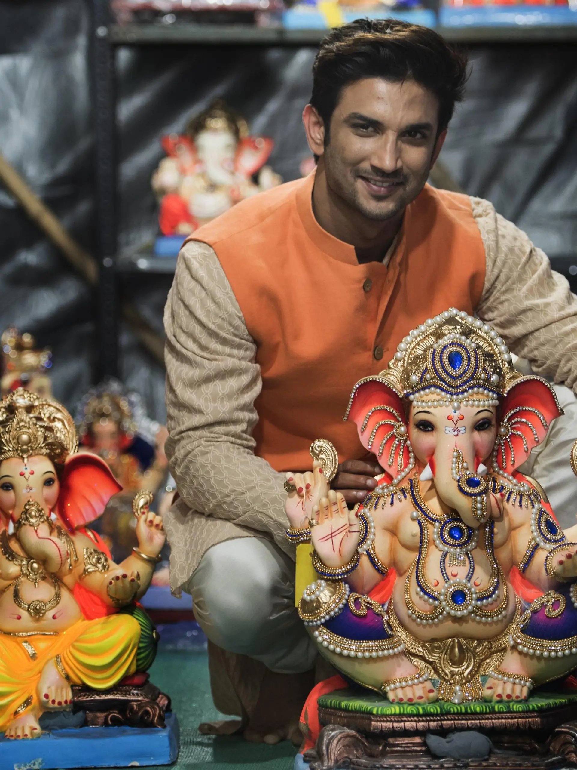 MUMBAI, INDIA - SEPTEMBER 2: Indian film and television actor Sushant Singh Rajput poses for the photos with elephant god Ganesha at workshop on September 2, 2016 in Mumbai, India. Ganesh Chaturthi is the festival celebrated by Hindus across the world in honour of Lord. During the festival, local communities put up public pandals for mass worship, while families bring home small clay idols to pray. When the festivities end, the idols are immersed in a large bodies of water. Photo by Satish Bate/Hindustan Times Bollywood Actor Sushant Singh Rajput Celebrates Ganesh Chaturthi Festival PUBLICATIONxNOTxINxIND