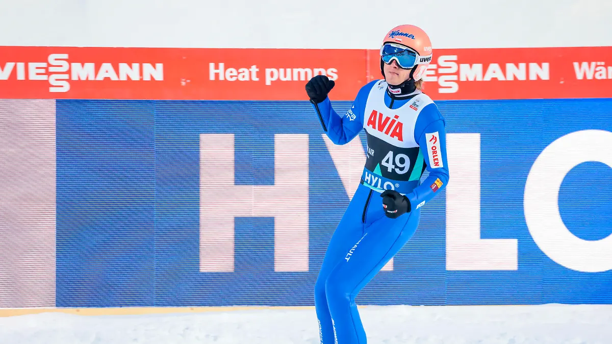 Dawid Kubacki from Poland celebrates after winning the men's skijumping in Lysgardsbakken in Lillehammer, Norway, Thursday March 16, 2023. (Geir Olsen/NTB Scanpix via AP)