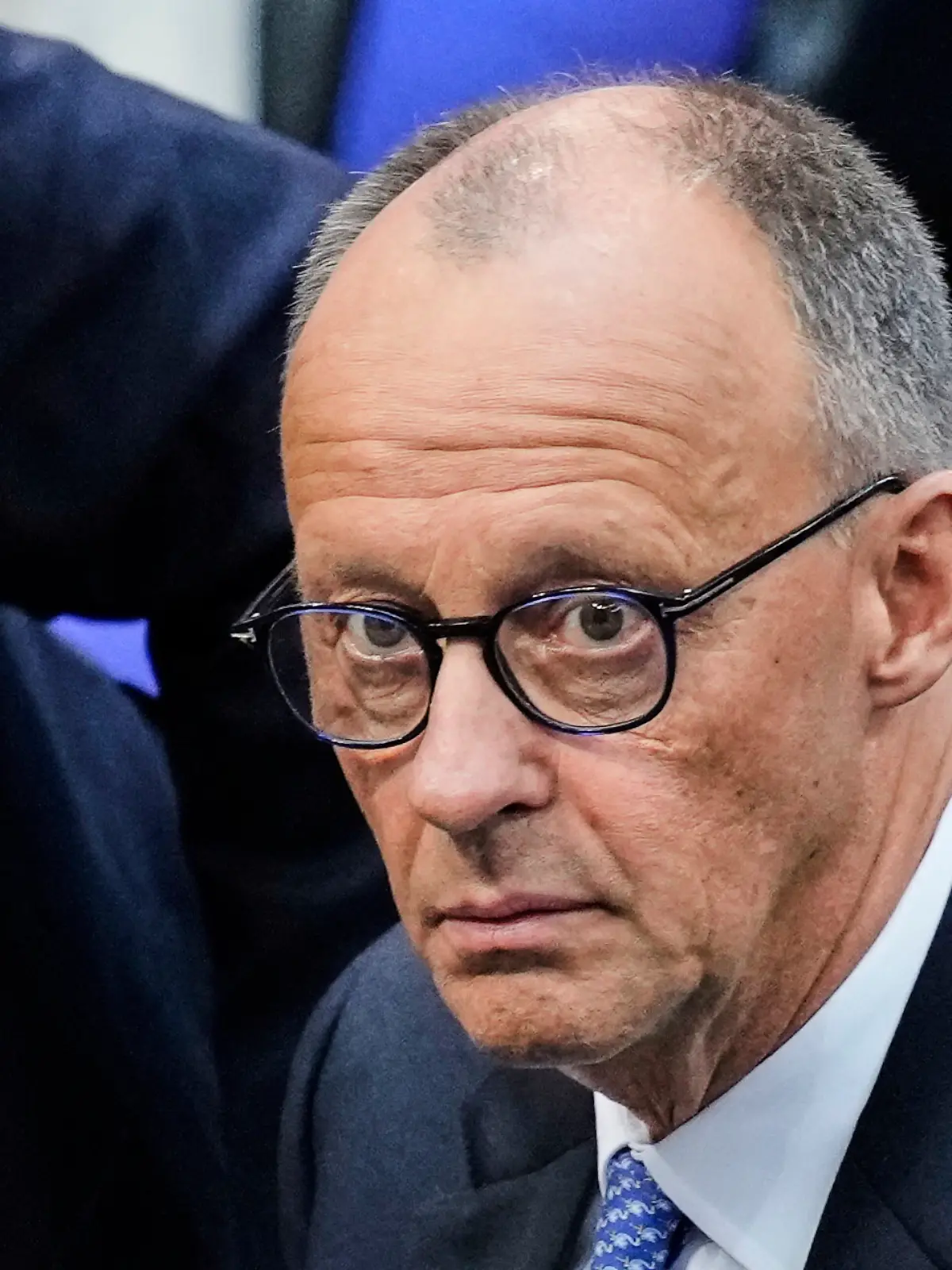 Friedrich Merz reacts after he was not elected new Chancellor in the first voting process at the parliament Bundestag in Berlin, Tuesday, May 6, 2025.