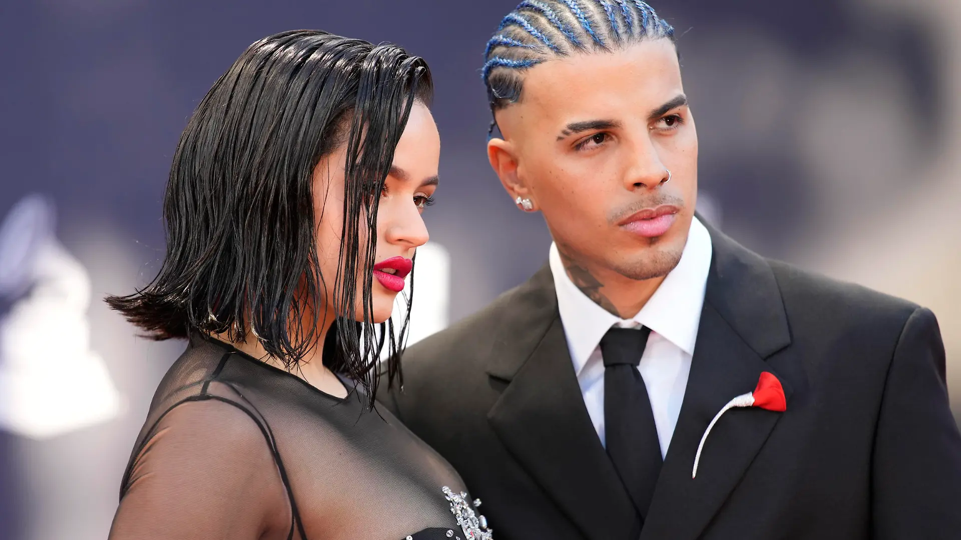 Rosalia, left, and Rauw Alejandro arrive at the 23rd annual Latin Grammy Awards at the Mandalay Bay Michelob Ultra Arena on Thursday, Nov. 17, 2022, in Las Vegas. (AP Photo/John Locher)