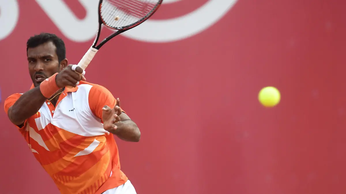 (190419) -- ANNING, April 19, 2019 (Xinhua) -- Sriram Balaji of India returns a shot during a men s doubles quarterfinal match between Bai Yan/Sun Fajing of China and Jamie Cerretani of the United States/Sriram Balaji of India at 2019 Kunming Open tennis tournament in Anning of southwest China s Yunnan Province, on April 19, 2019. (Xinhua/Qin Qing) (SP)CHINA-ANNING-TENNIS-KUNMING OPEN (CN) PUBLICATIONxNOTxINxCHN