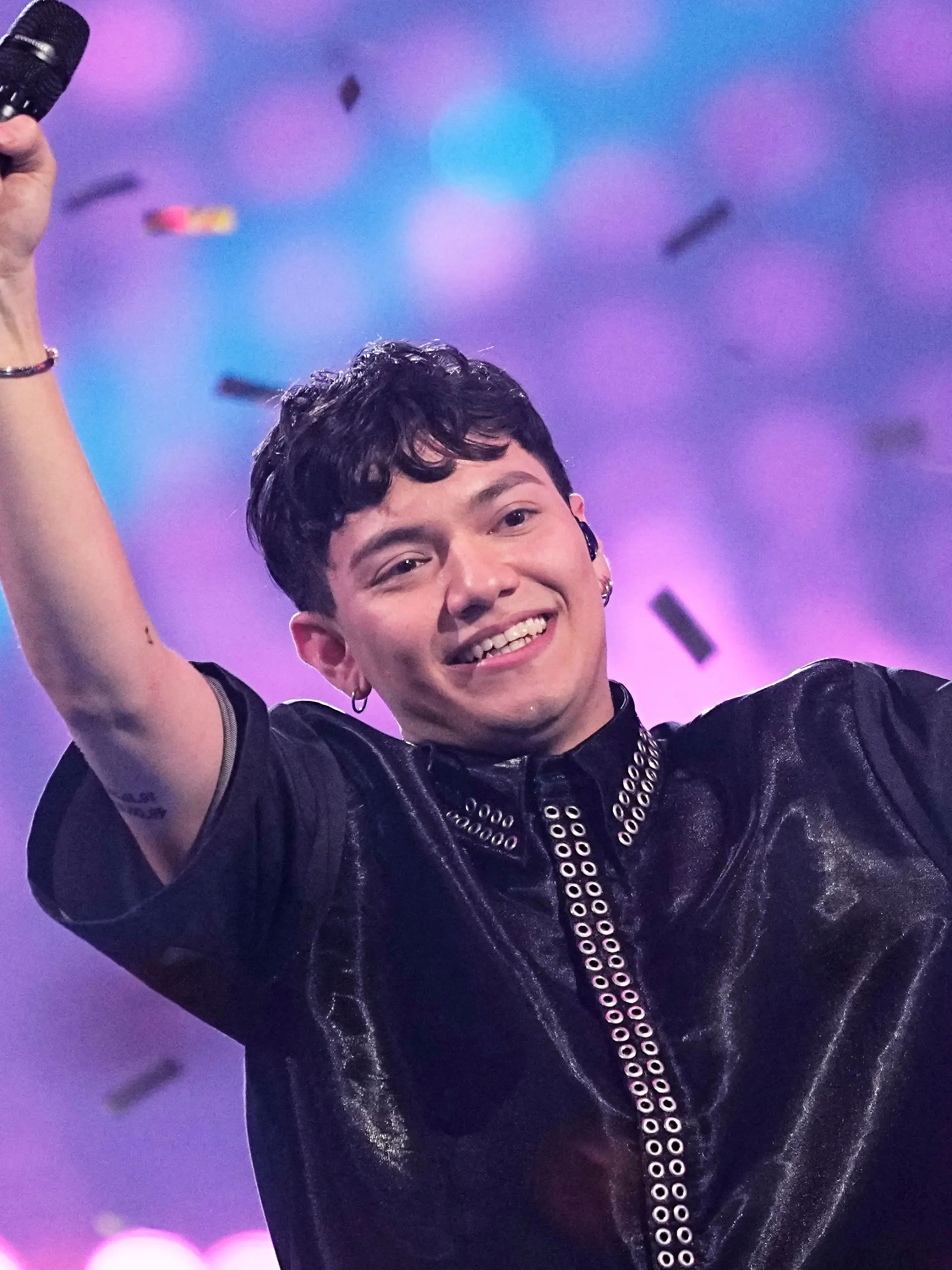 Winner of the Eurovision Song Contest JJ from Austria holds up the trophy onstage, he won with the song „Wasted Love” during the Grand Final of the 69th Eurovision Song Contest, in Basel, Switzerland, Saturday, May 17, 2025. (AP Photo/Martin Meissner)
