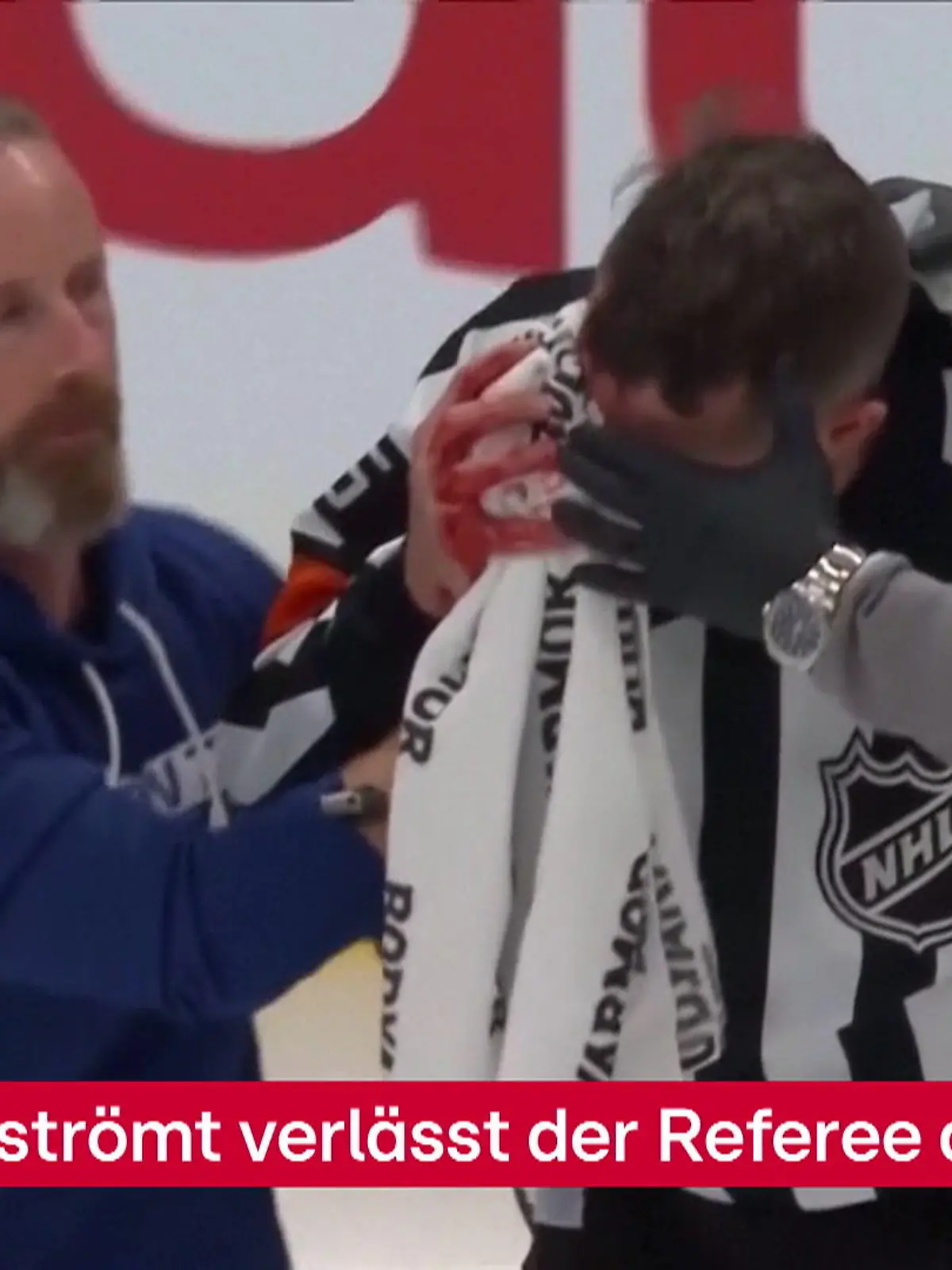 Bild zu: "NHL-Referee bekommt Schläger ins Gesicht"