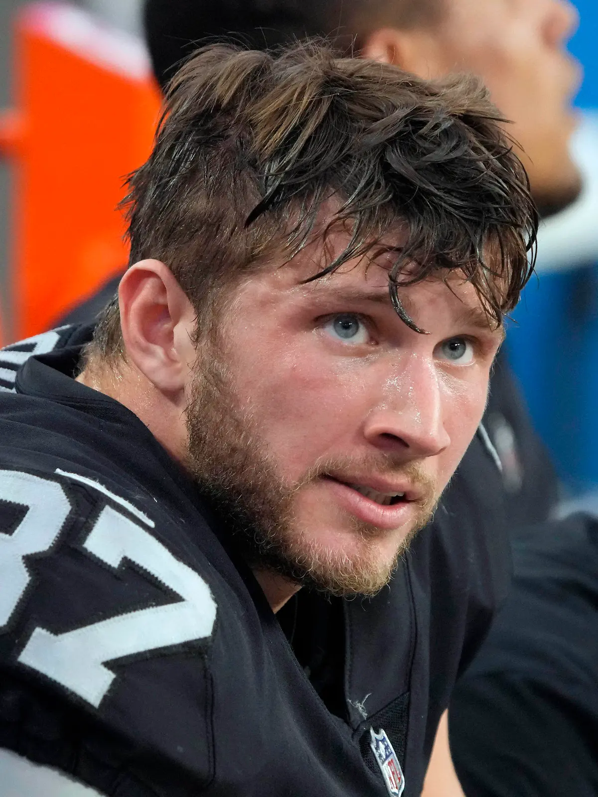 FILE -Las Vegas Raiders tight end Foster Moreau (87) watches from the sideline during the first half of an NFL football game against the Kansas City Chiefs, Saturday, Jan. 7, 2023, in Las Vegas. NFL free-agent tight end Foster Moreau was diagnosed with Hodgkin’s lymphoma during a physical with the New Orleans Saints, he posted Wednesday, March 22, 2023 on Twitter.(AP Photo/Rick Scuteri, File)