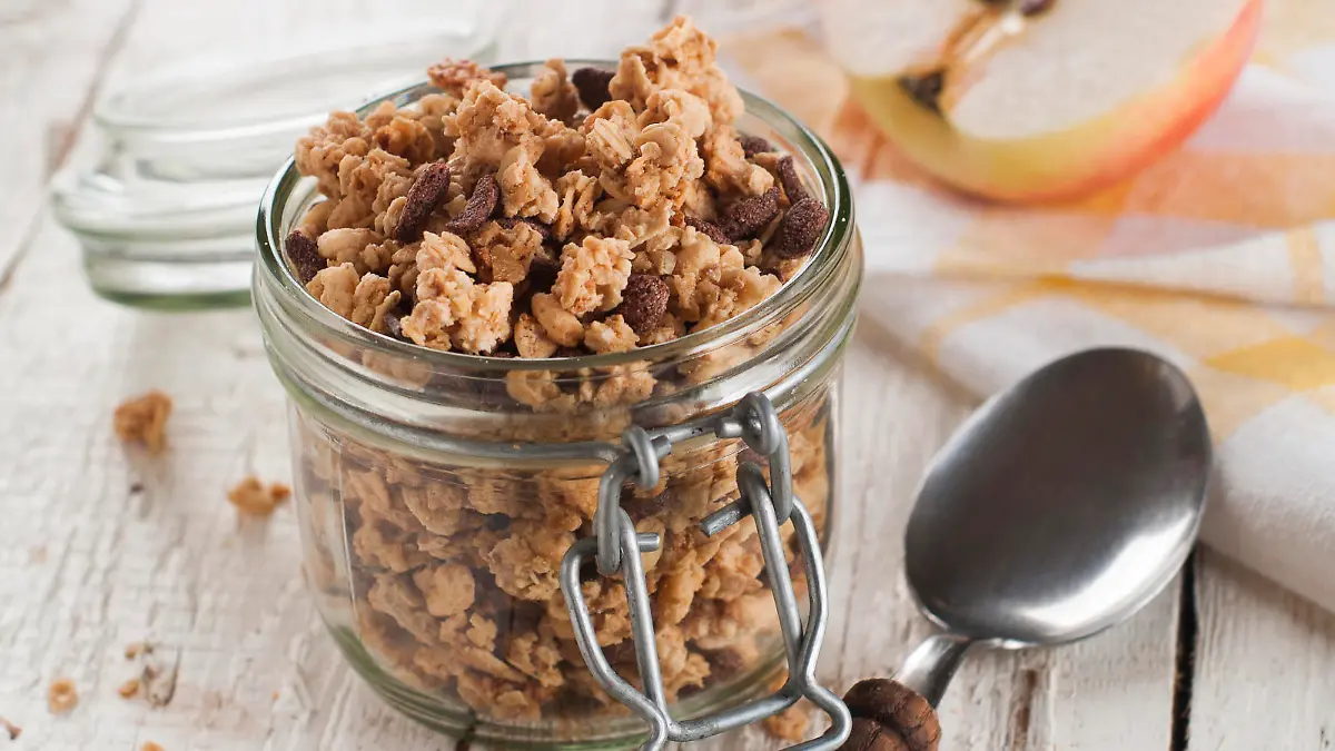 Healthy breakfast muesli with nut and chocolate, selective focus